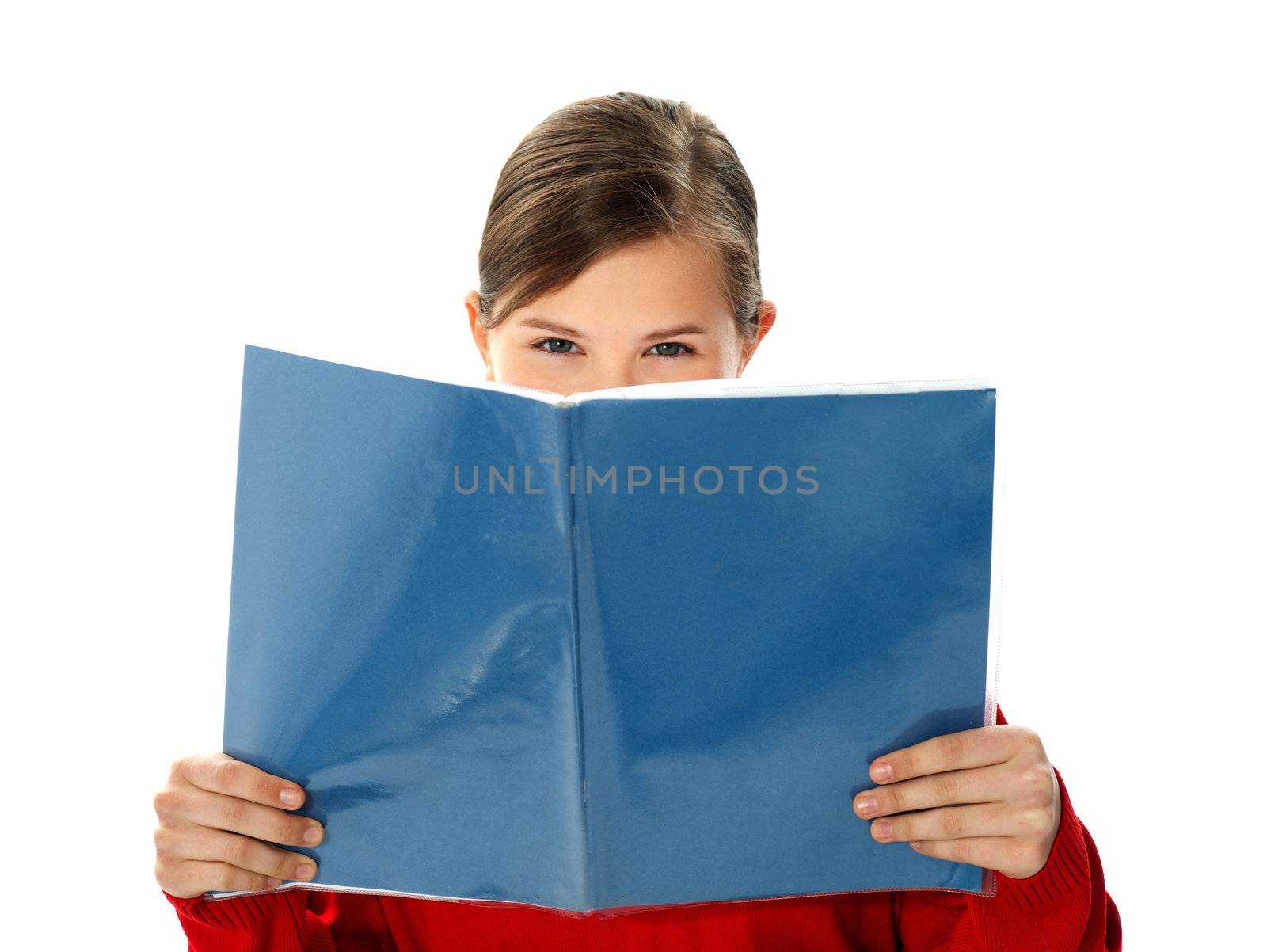 Intelligent school girl reading study book by stockyimages