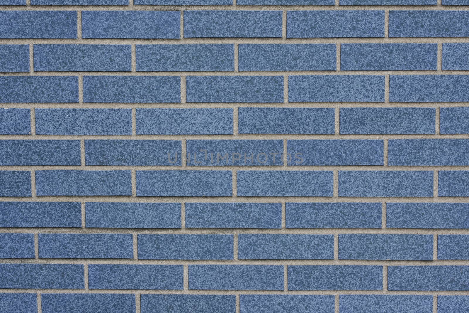 A blue brick wall background, horizontal orientation