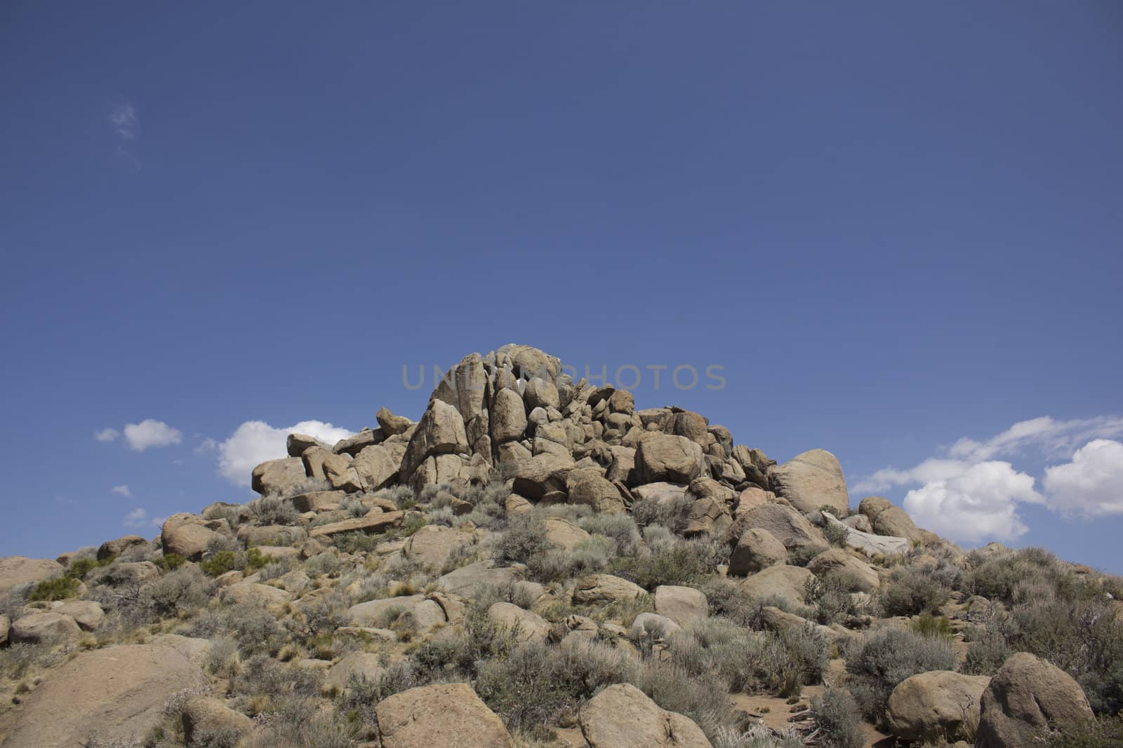 Rock boulders with a blue sky in the back ground