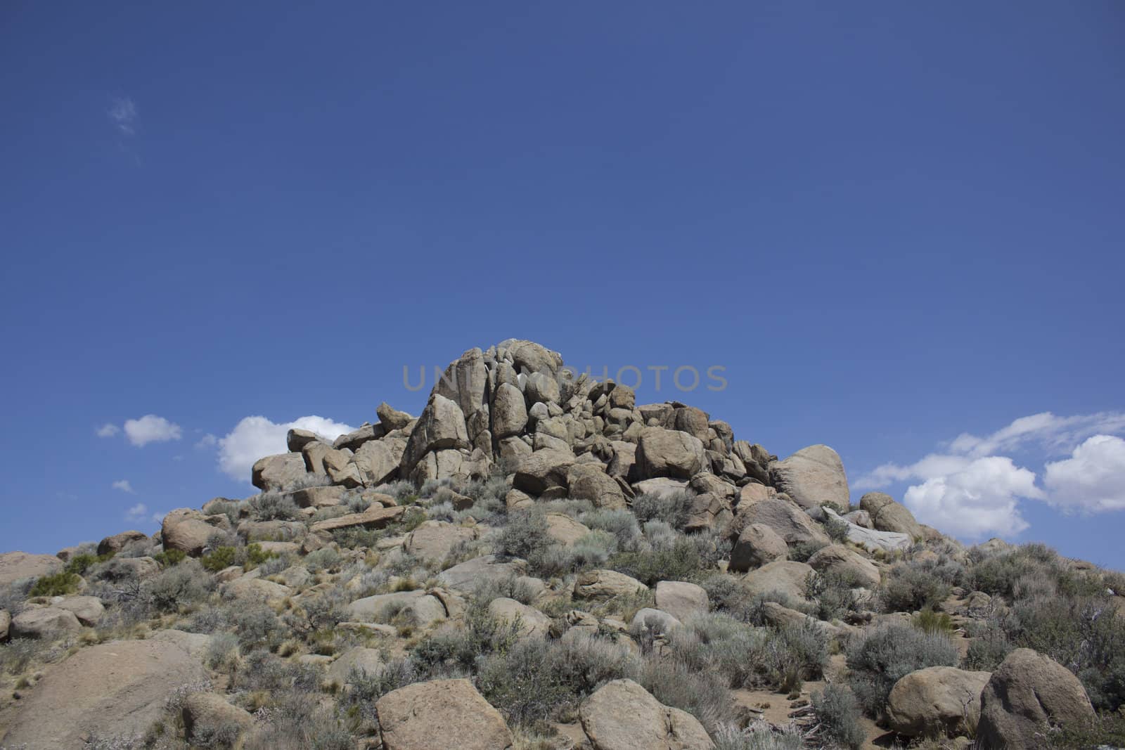 Rock boulders with a blue sky in the back ground