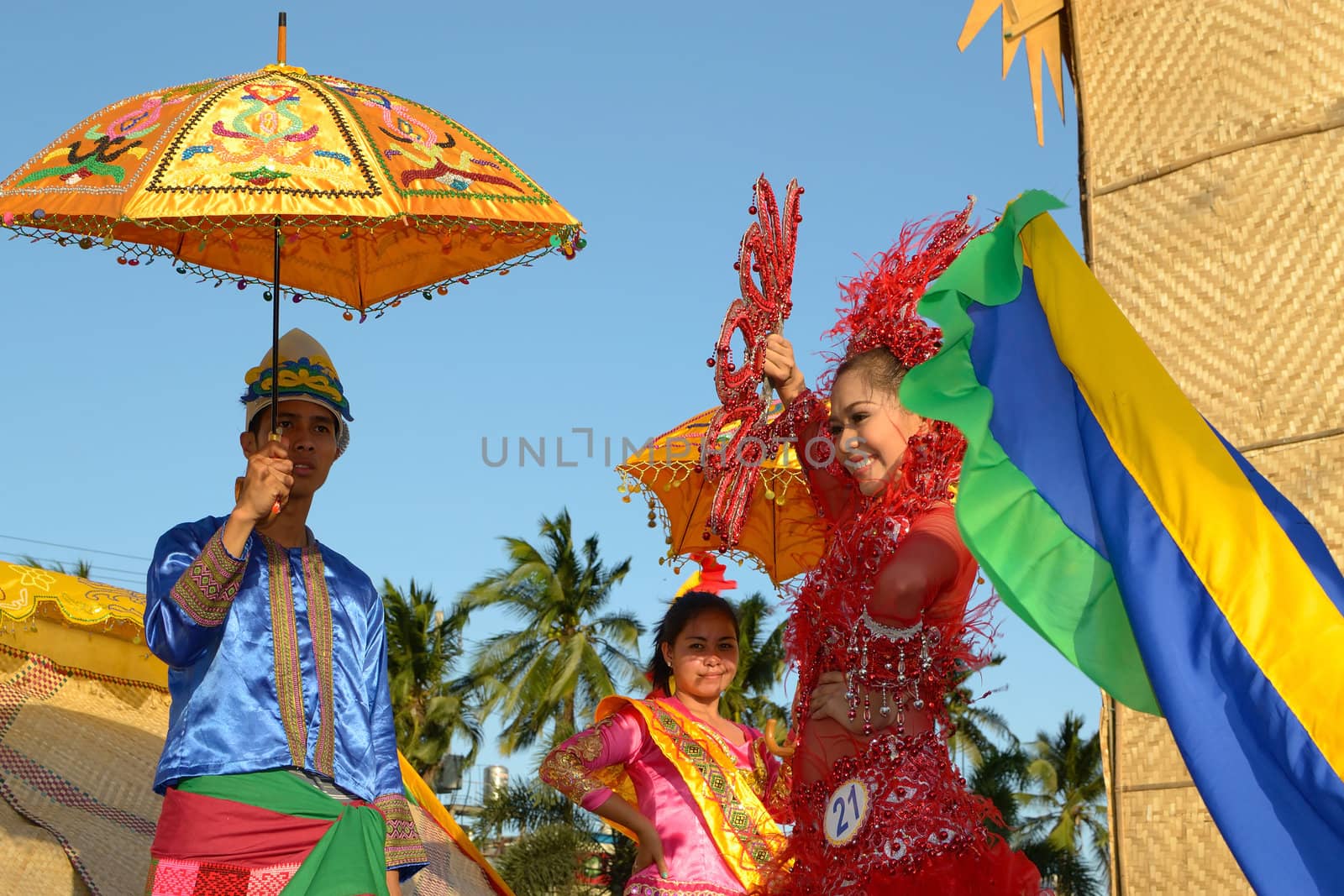 MANILA, PHILIPPINES - APR. 14: pageant contestant in her cultural dress pauses during Aliwan Fiesta, which is the biggest annual national festival competition on April 14, 2012 in Manila Philippines.