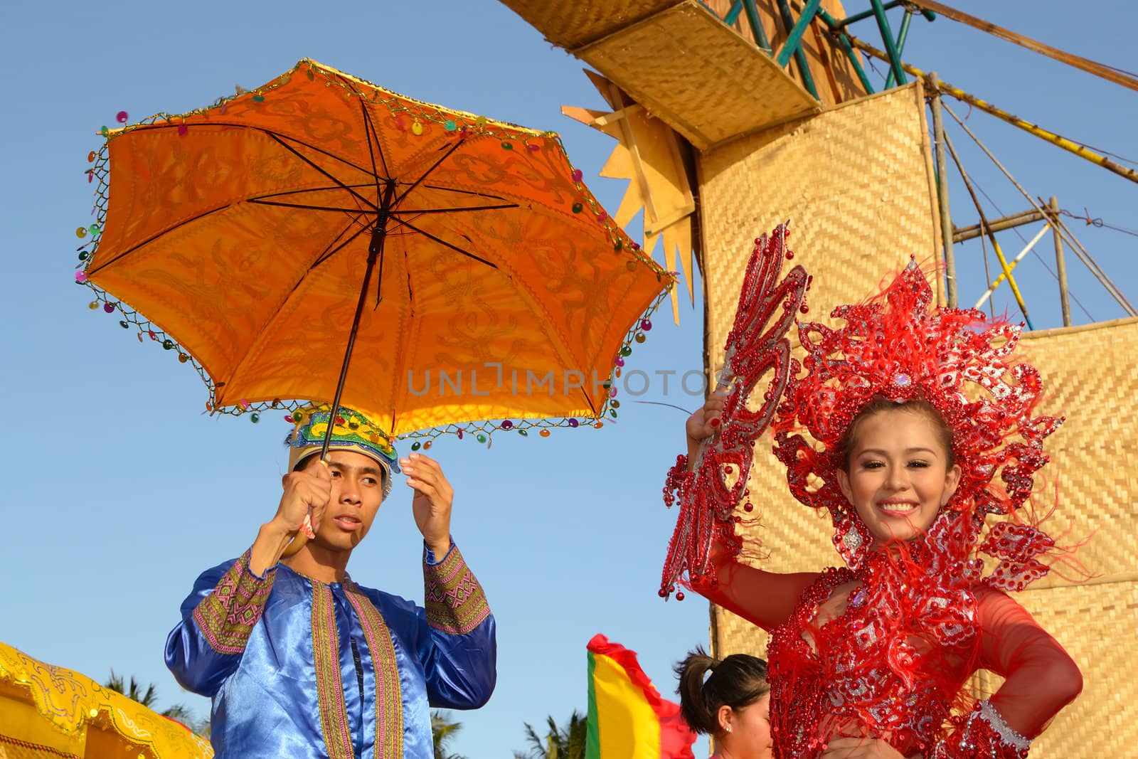 MANILA, PHILIPPINES - APR. 14: pageant contestant in her cultural dress pauses during Aliwan Fiesta, which is the biggest annual national festival competition on April 14, 2012 in Manila Philippines.