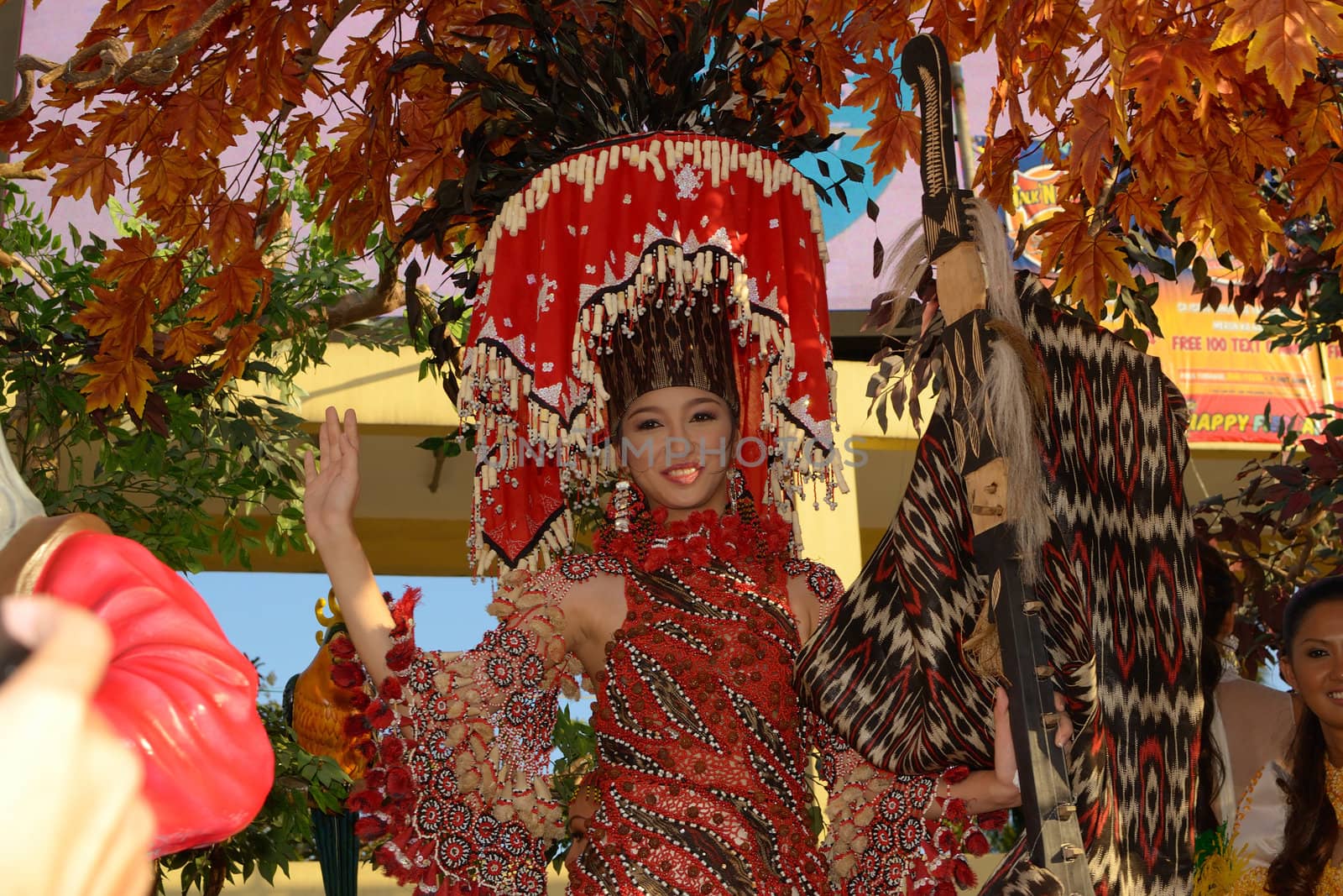 MANILA, PHILIPPINES - APR. 14: pageant contestant in her cultural dress pauses during Aliwan Fiesta, which is the biggest annual national festival competition on April 14, 2012 in Manila Philippines.