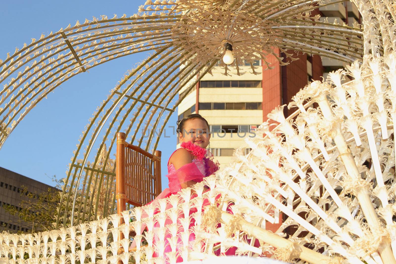 MANILA, PHILIPPINES - APR. 14: parade contestant in her cultural outfit smiles during Aliwan Fiesta, which is the biggest annual national festival competition on April 14, 2012 in Manila Philippines.