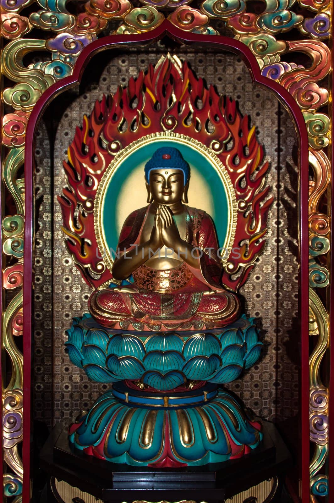 Chinese Buddha statue in Chinese Buddhism temple in Singapore