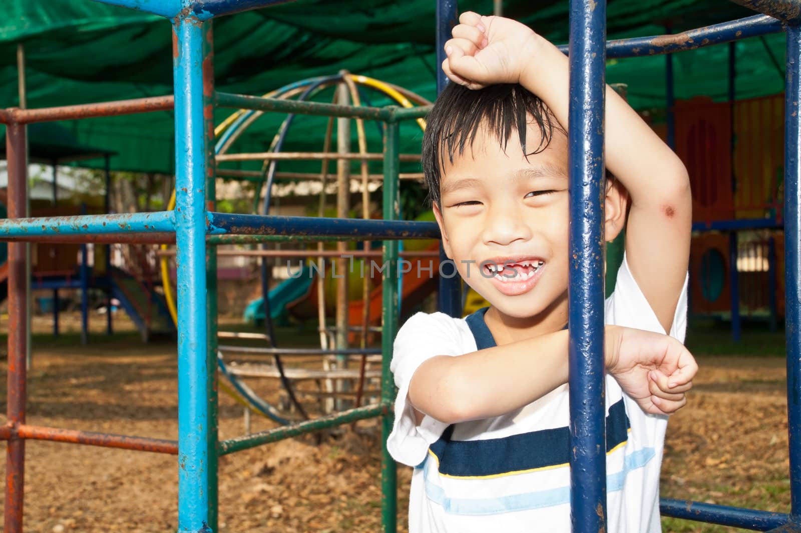 An handsome Asian kid of Thailand in Playground