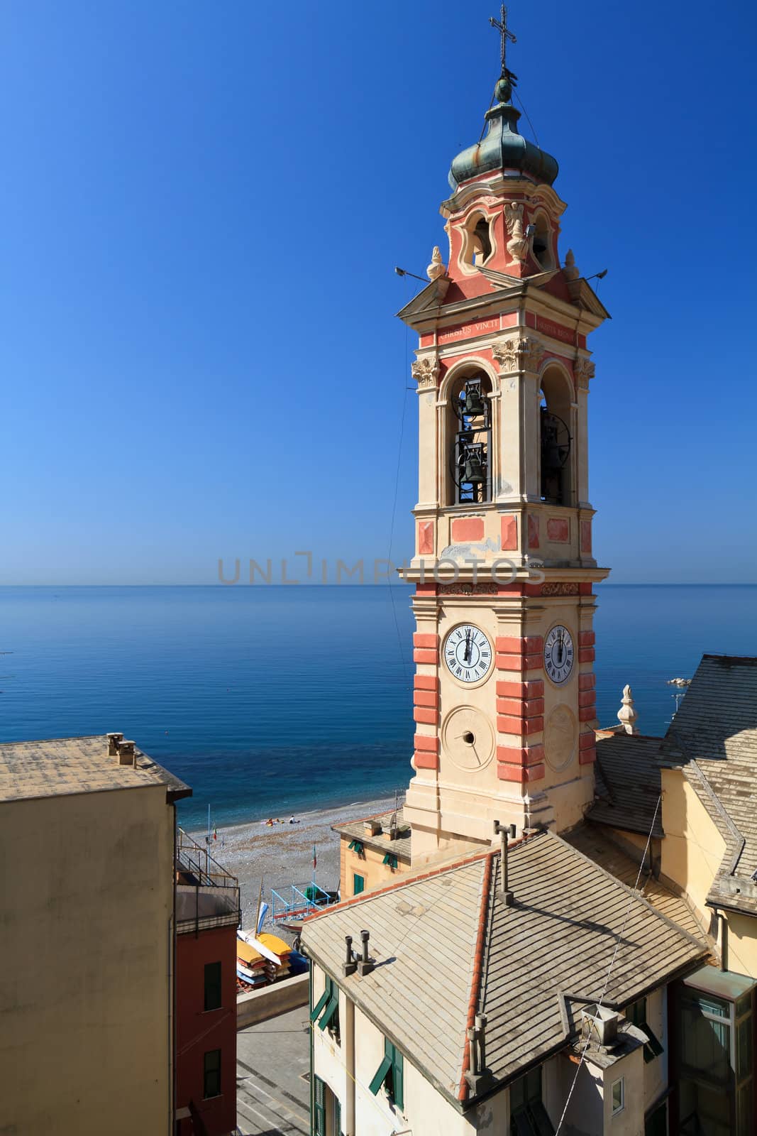 bell tower and village of Sori, small town in Liguria, Italy 