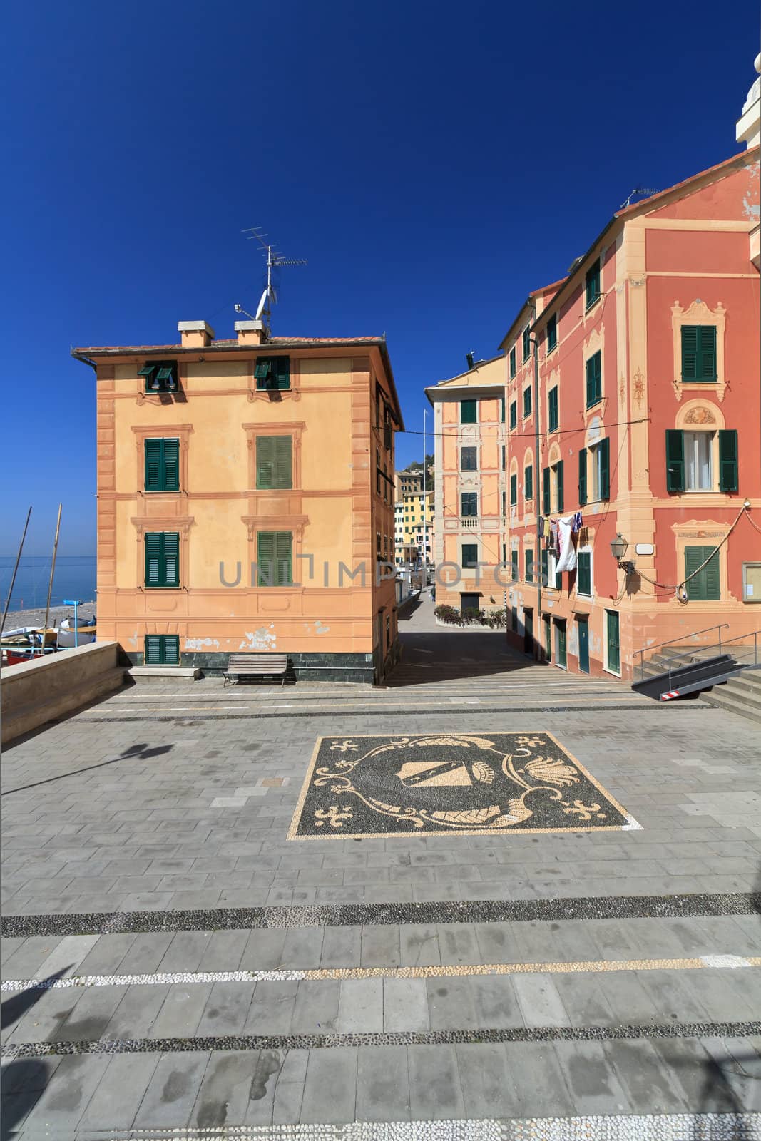small square in Sori village, Liguria, Italy - vertical composition