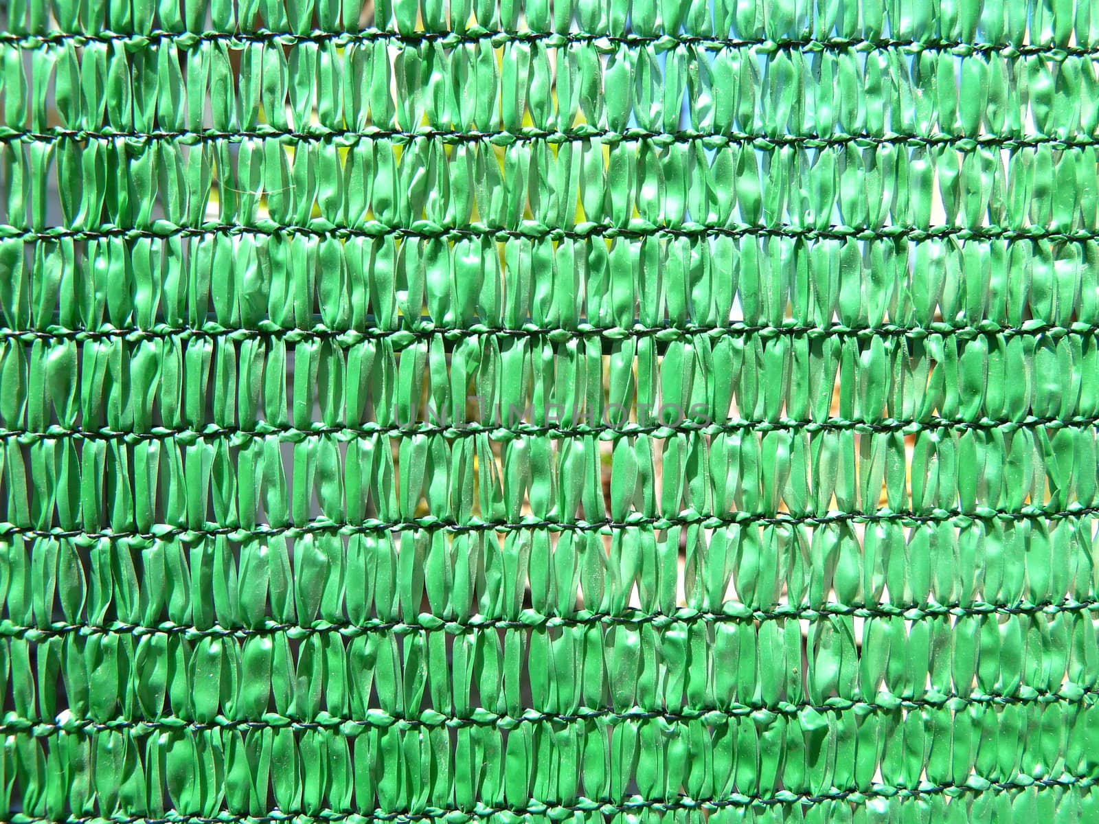 section of a bright green plastic screen