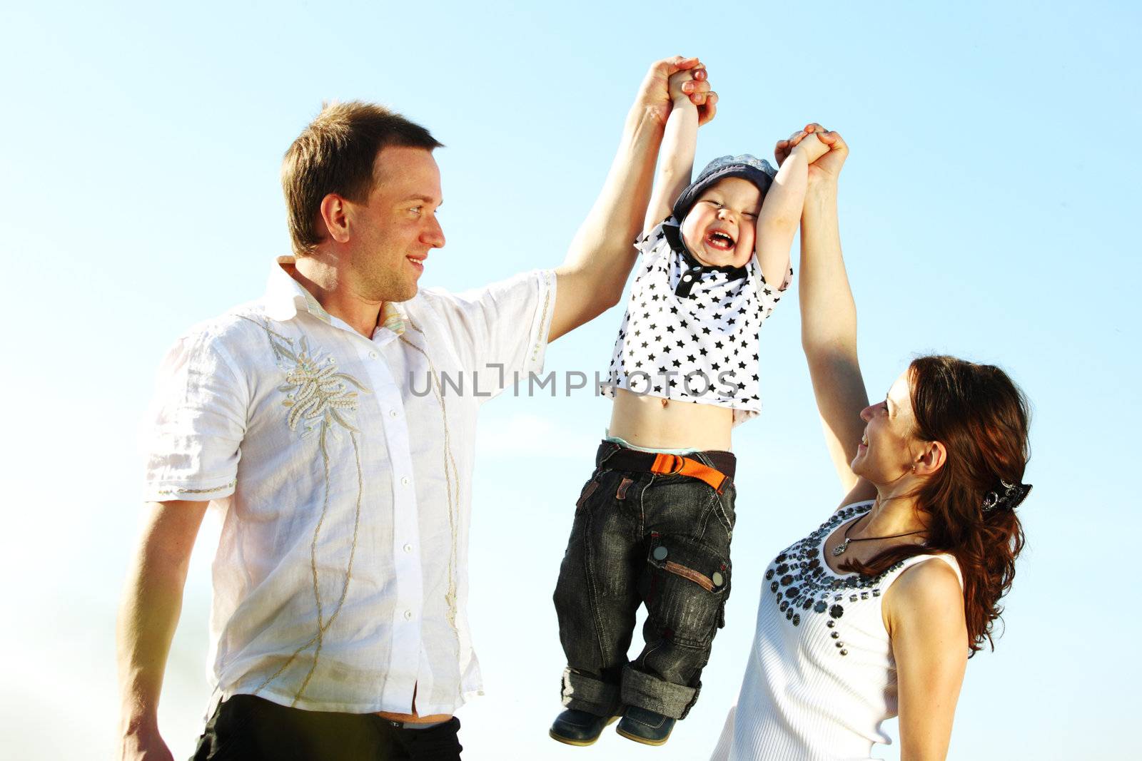 happy family on blue sky background