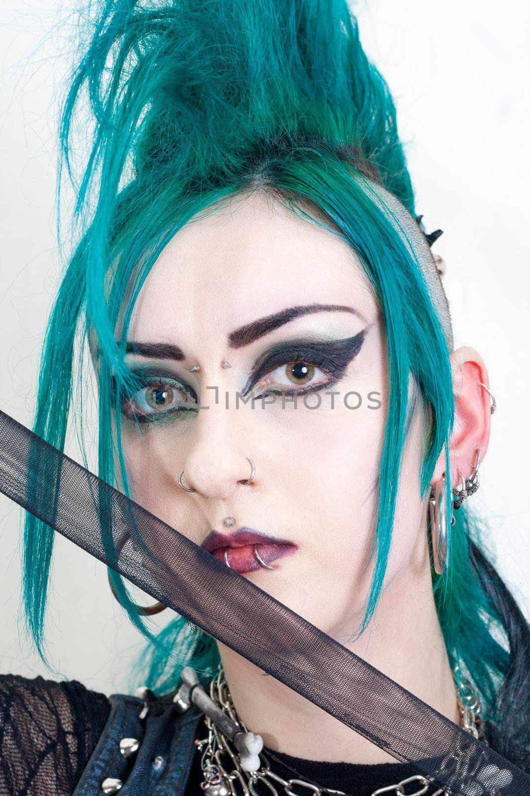 green haired postpunk girl on white background