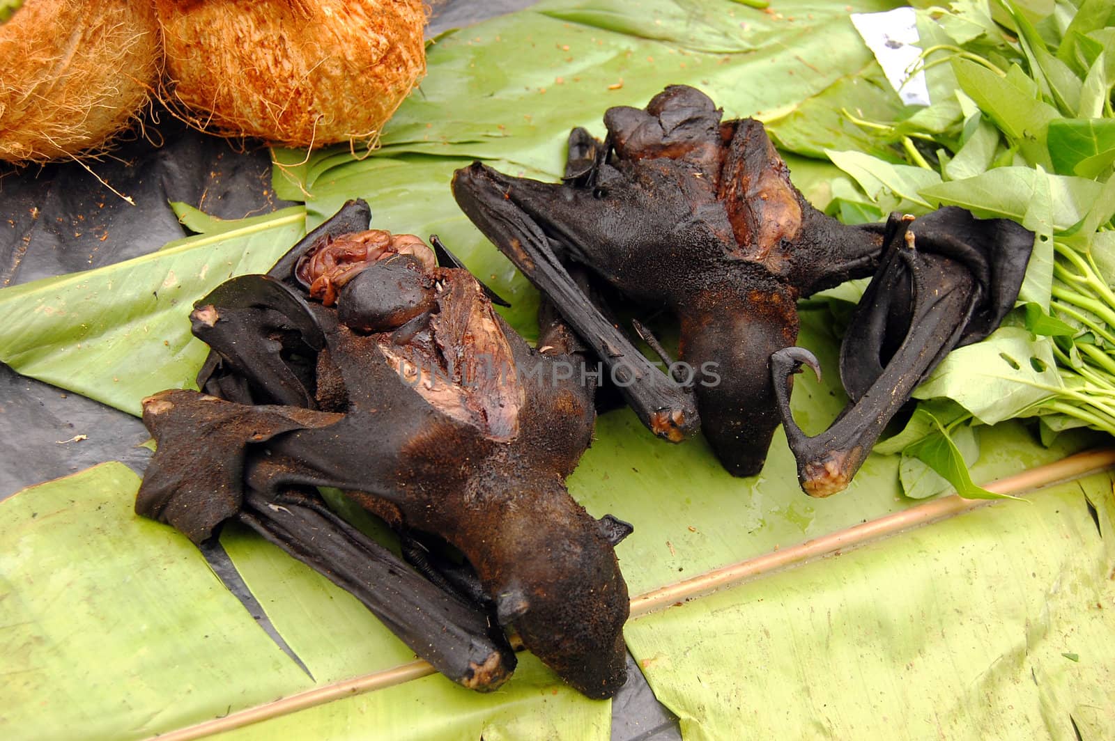 Fried rat at banana leaf, Wewak town, Papua New Guinea
