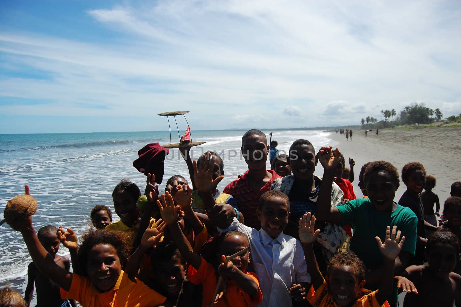 Smiling children at beach, Papua New Guinea