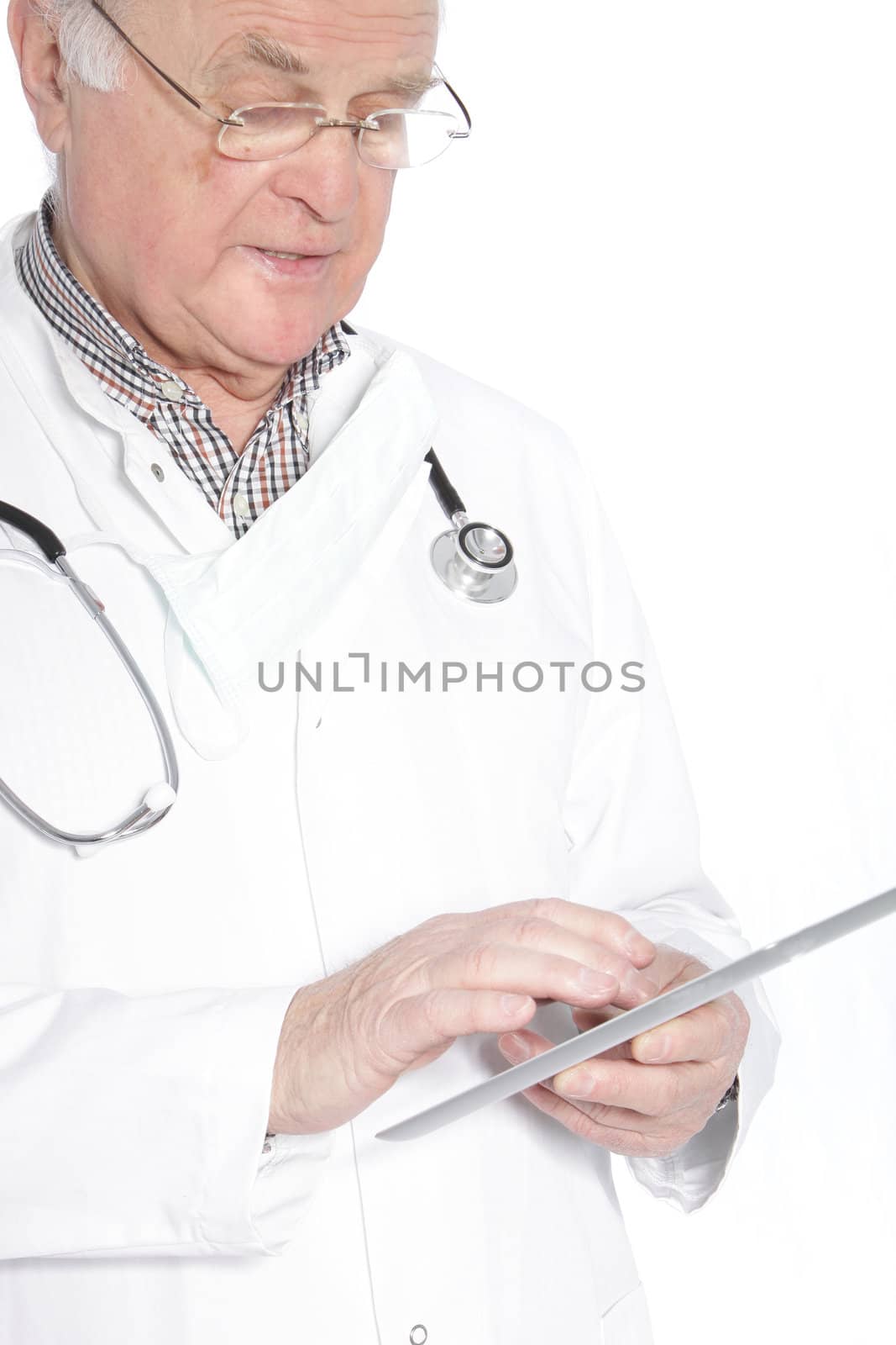 Senior doctor working on a tablet by Farina6000