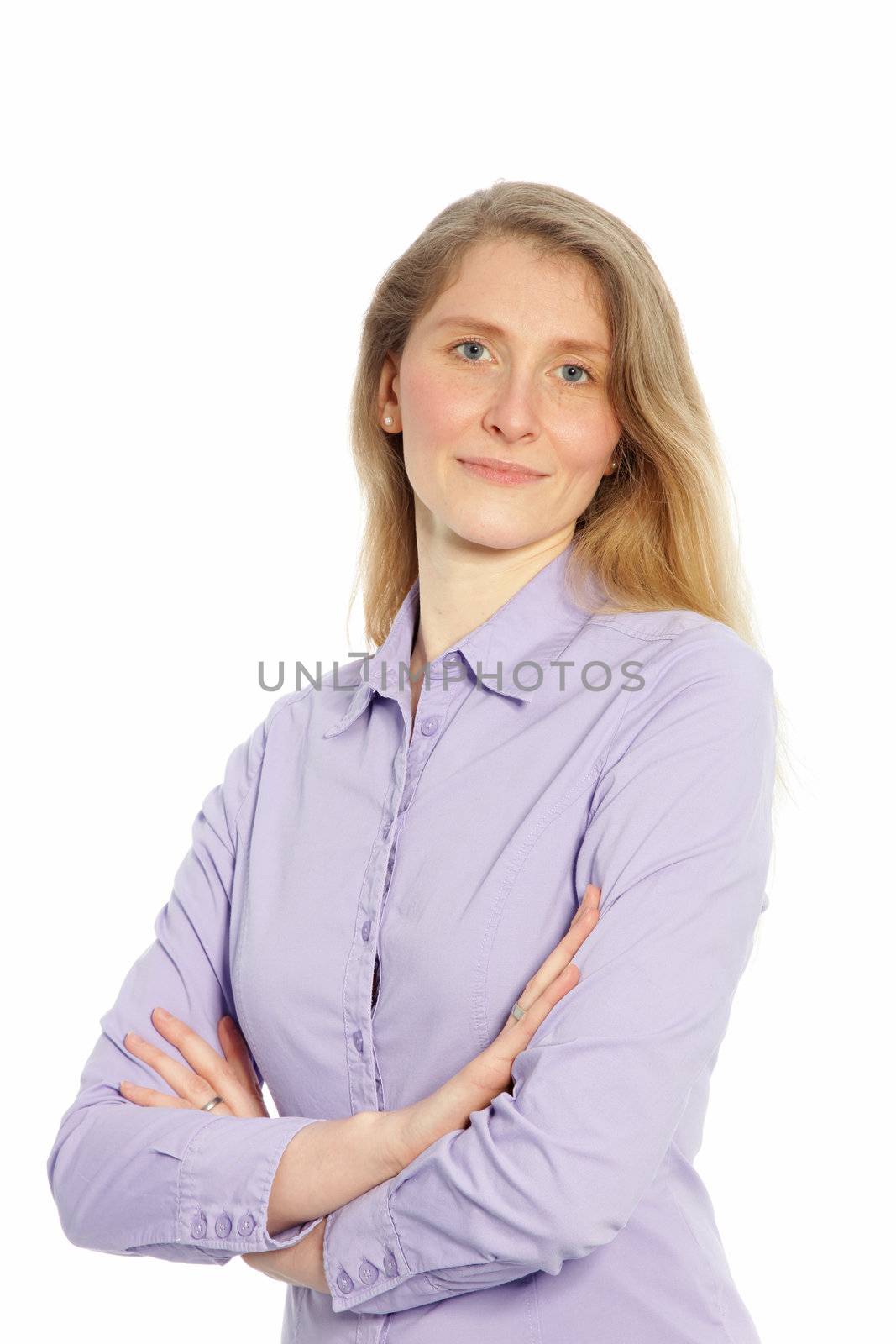Portrait of an attractive caucasian woman with her arms folded.