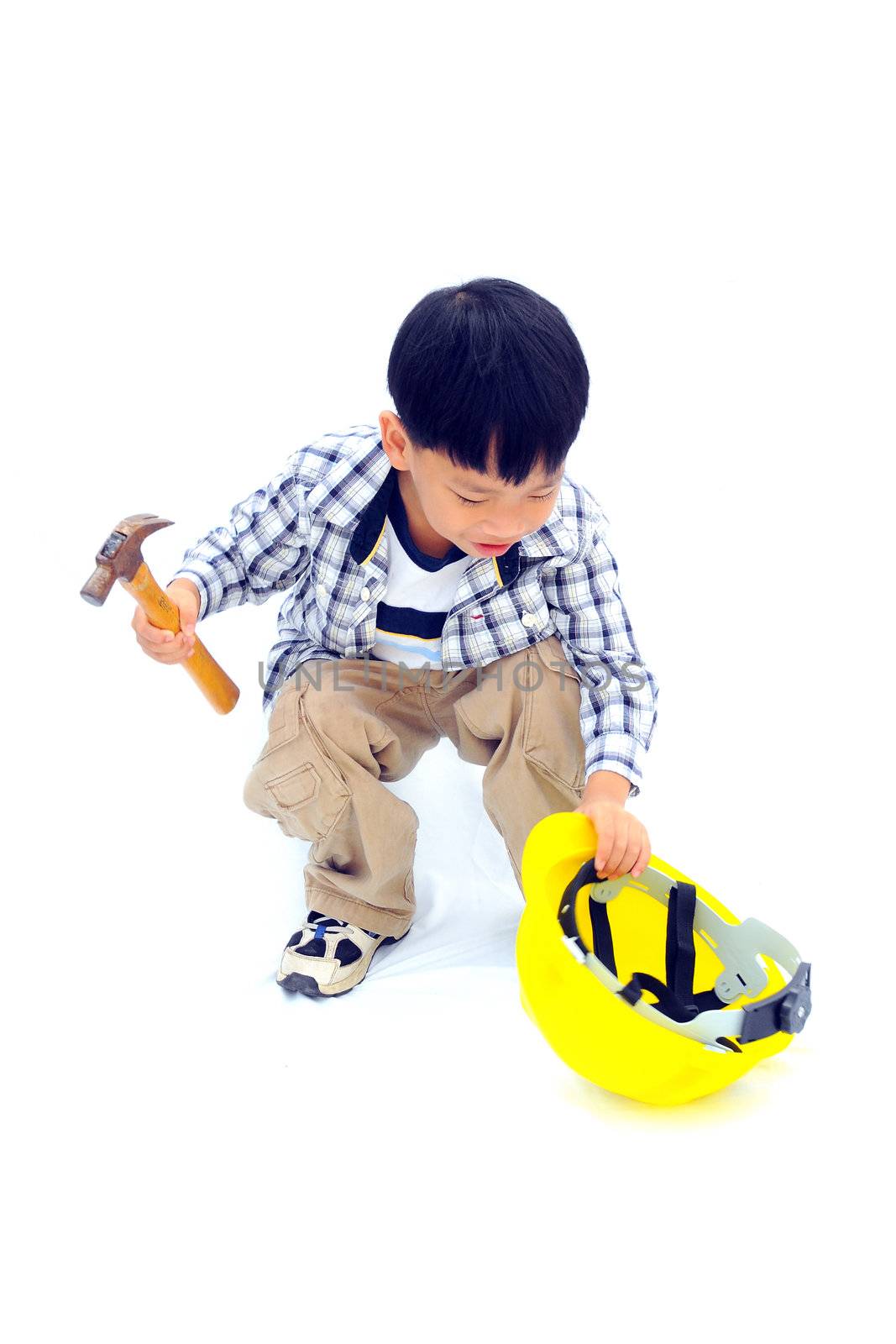 Asian Little boy with tools - isolated on white background by Yuri2012