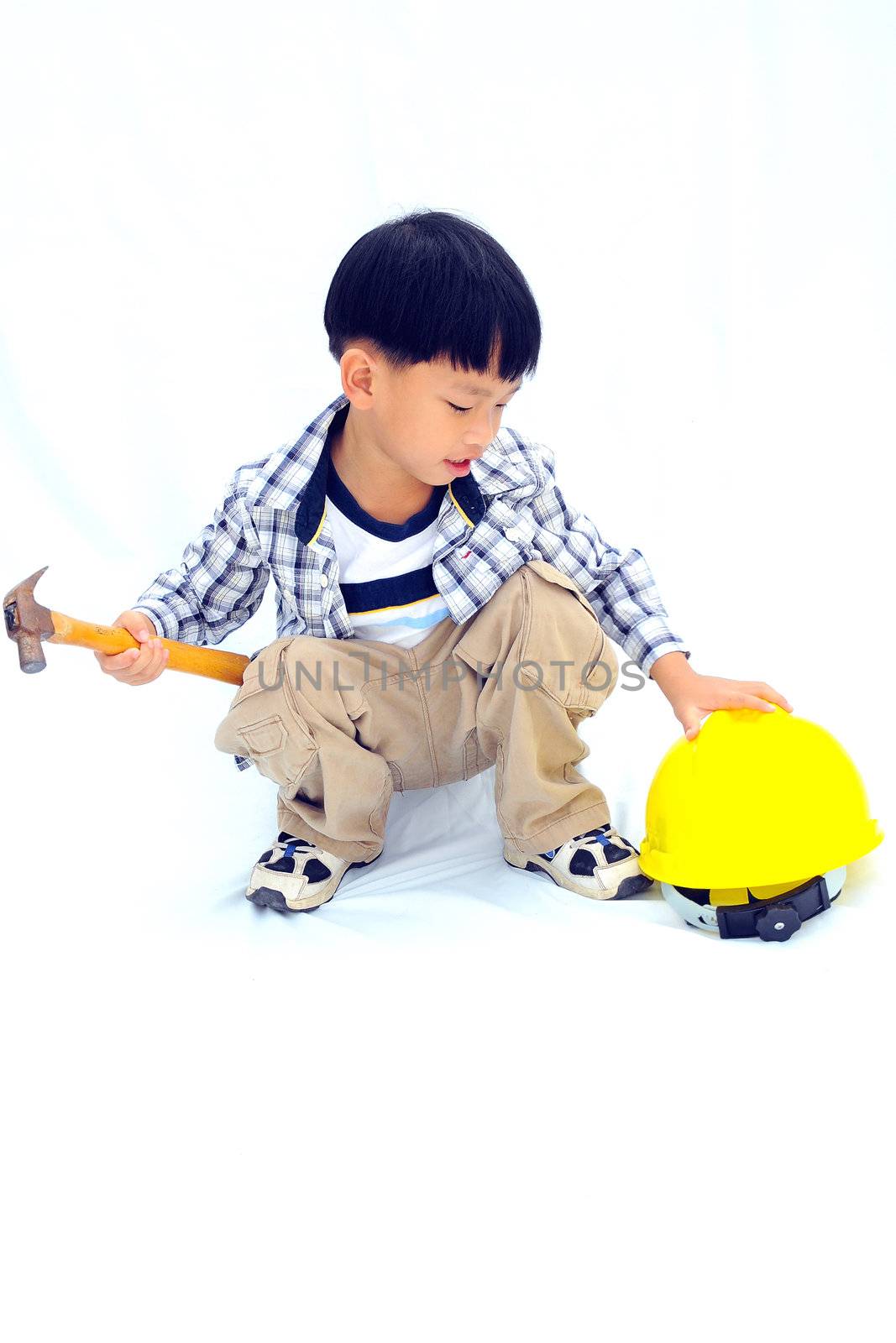 Asian Little boy with tools - isolated on white background by Yuri2012