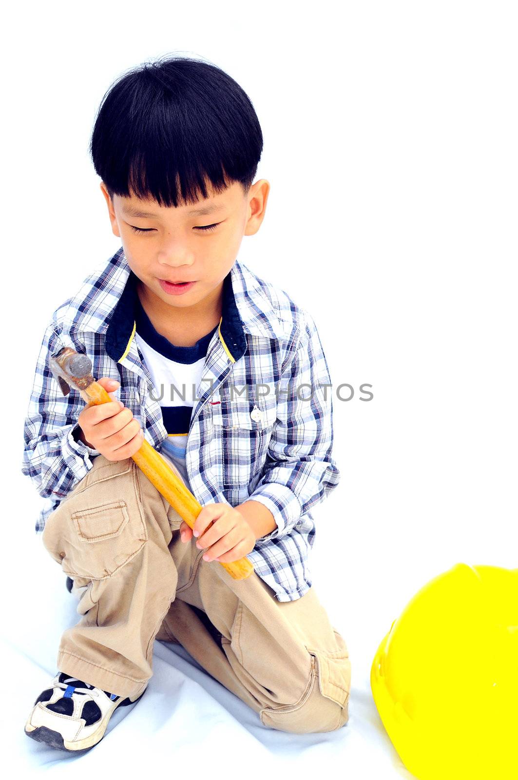 Asian Little boy with tools - isolated on white background by Yuri2012