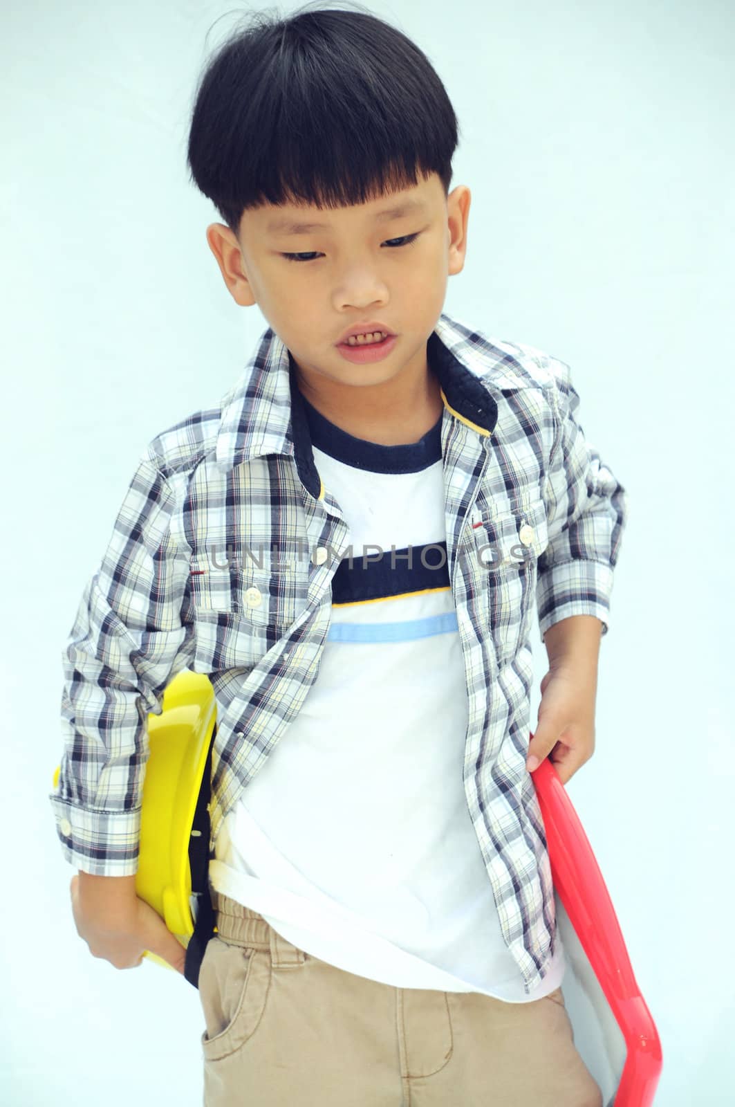 Asian little boy with blank marker board - isolated on white background