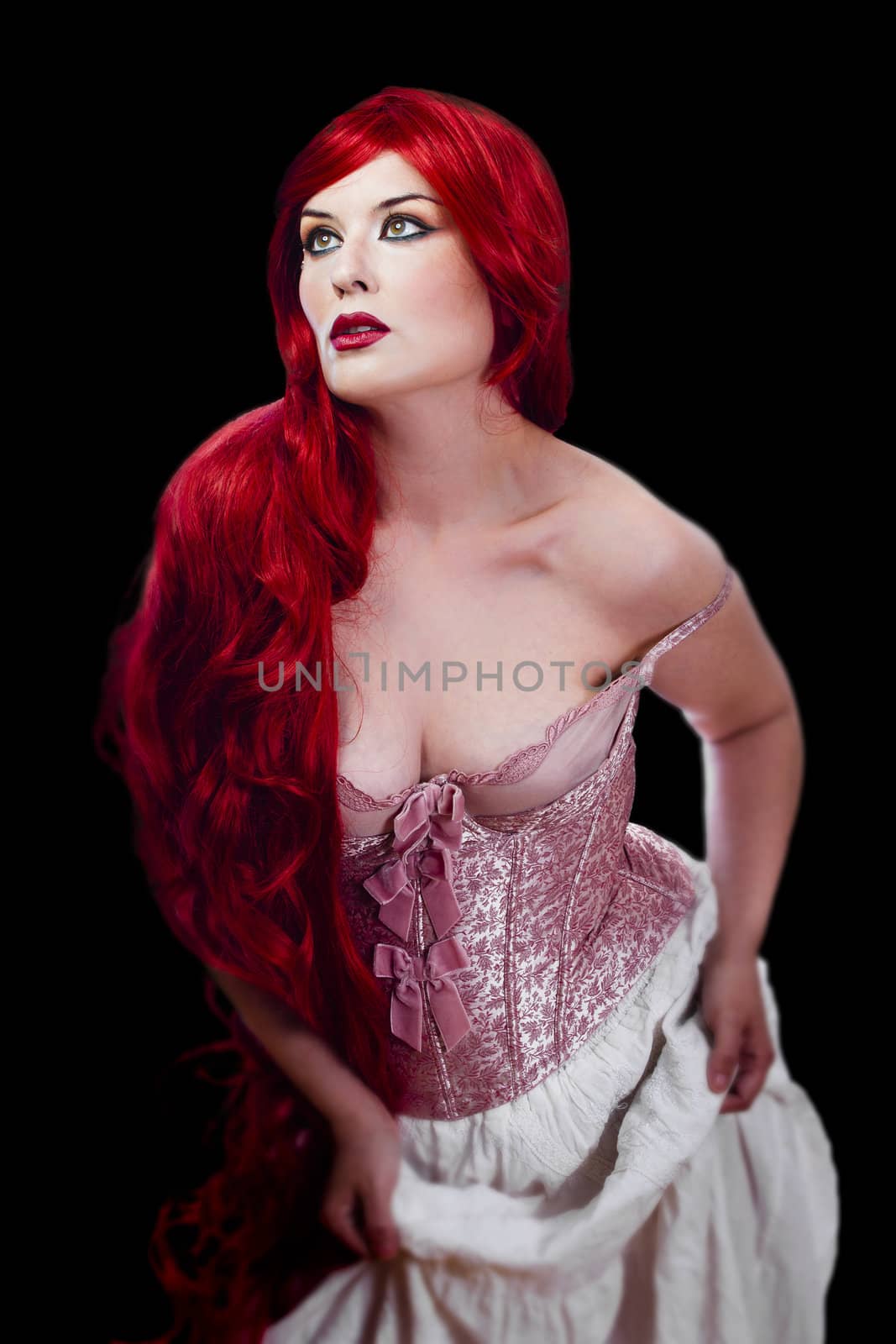 Red haired woman in lingerie over black background by FernandoCortes