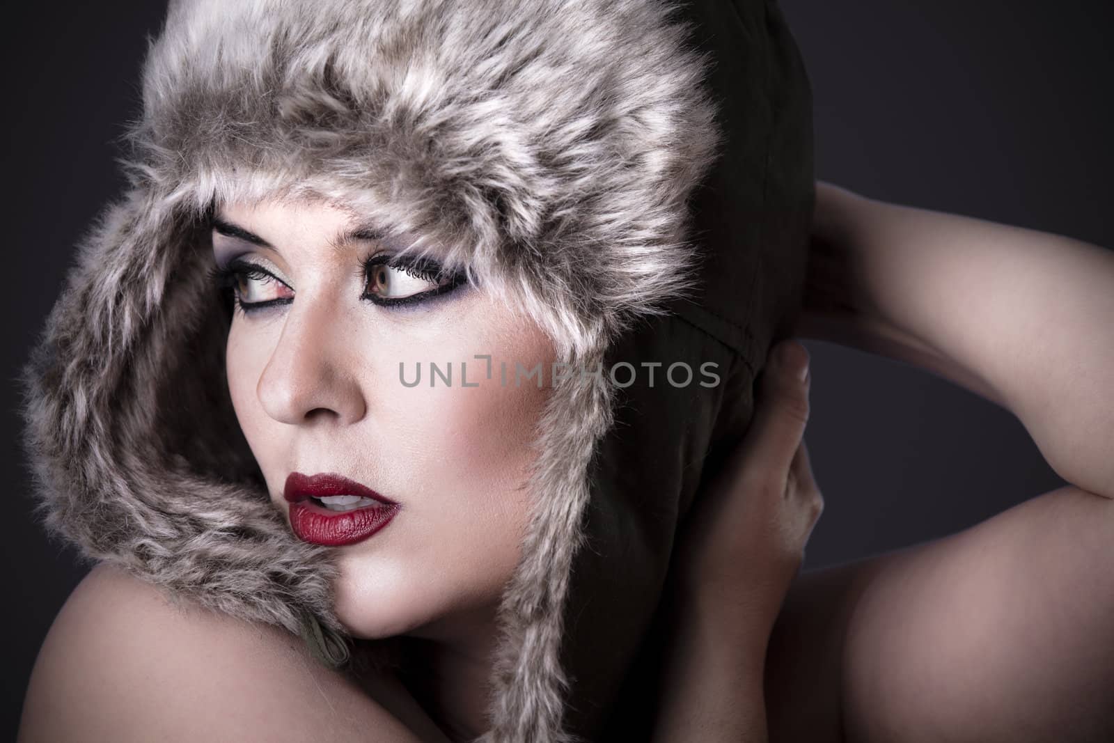 Portrait of beautiful girl with the winter hat on by FernandoCortes