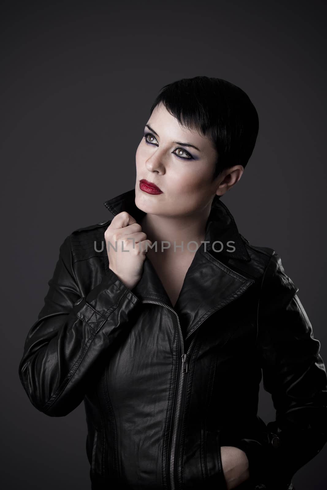 beautiful brunette young woman in black leather jacket, studio s by FernandoCortes