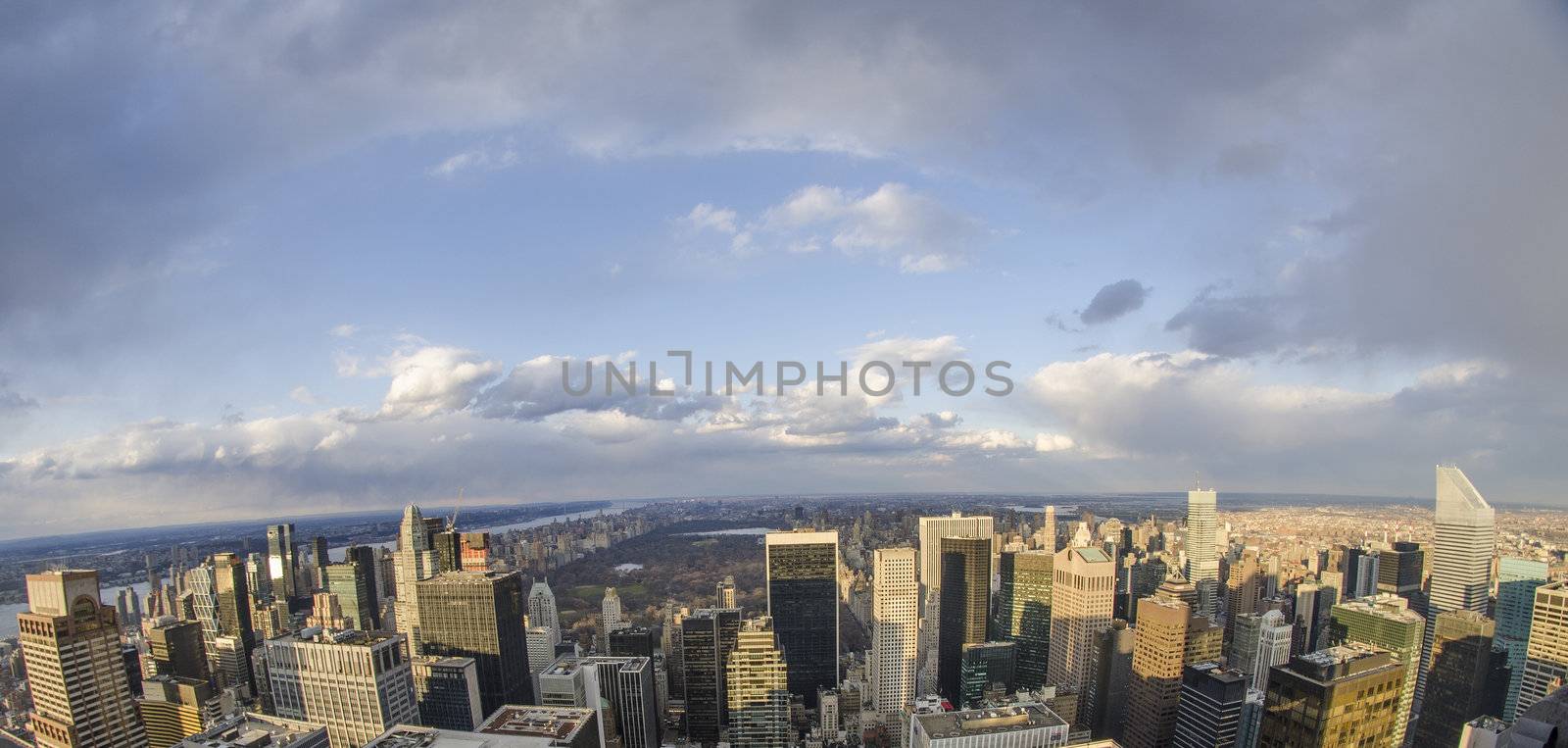 Giant Skyscrapers Exterior with Clouds in Background by jovannig