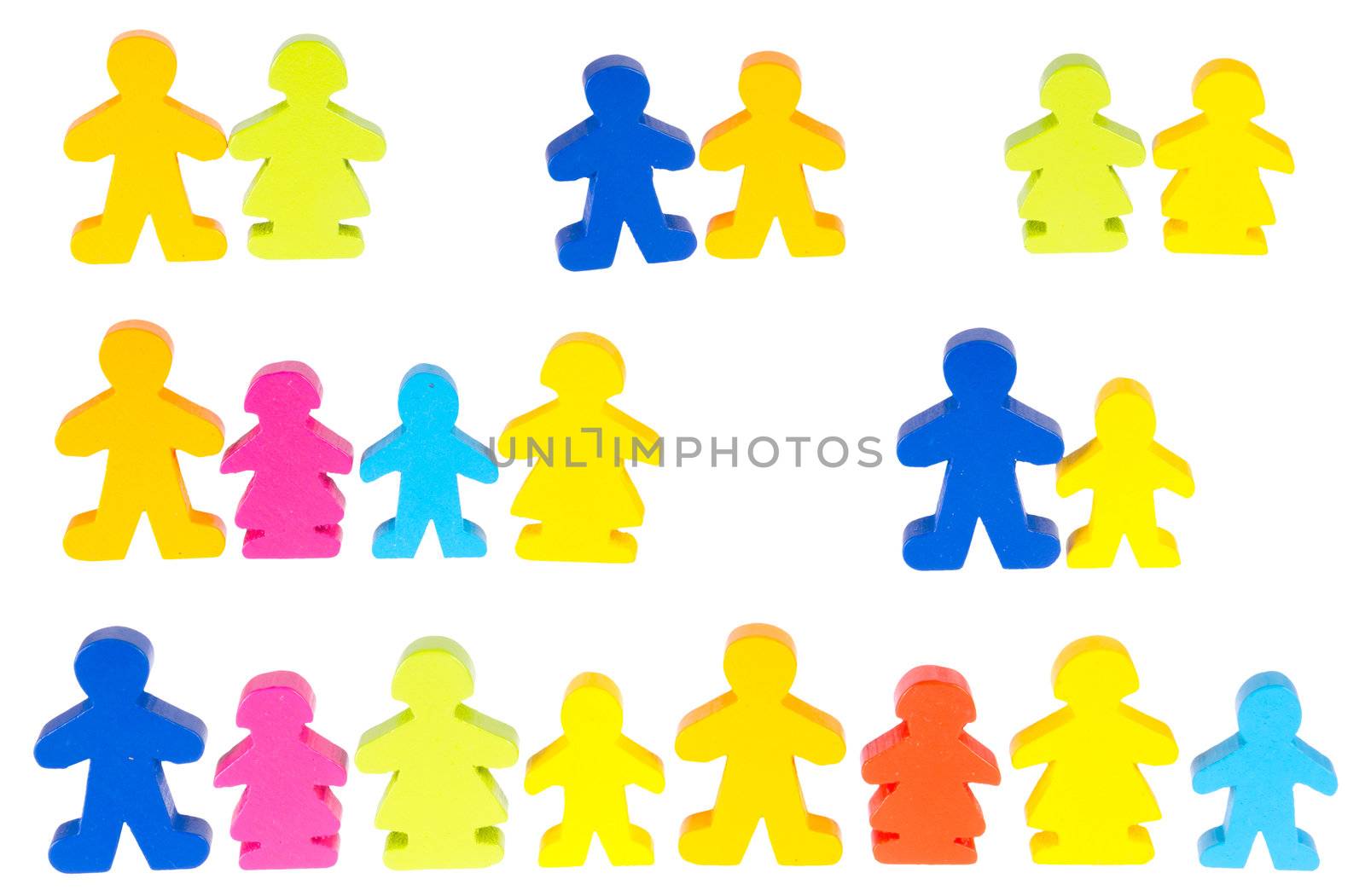 Wooden figures in different groups, isolated on background