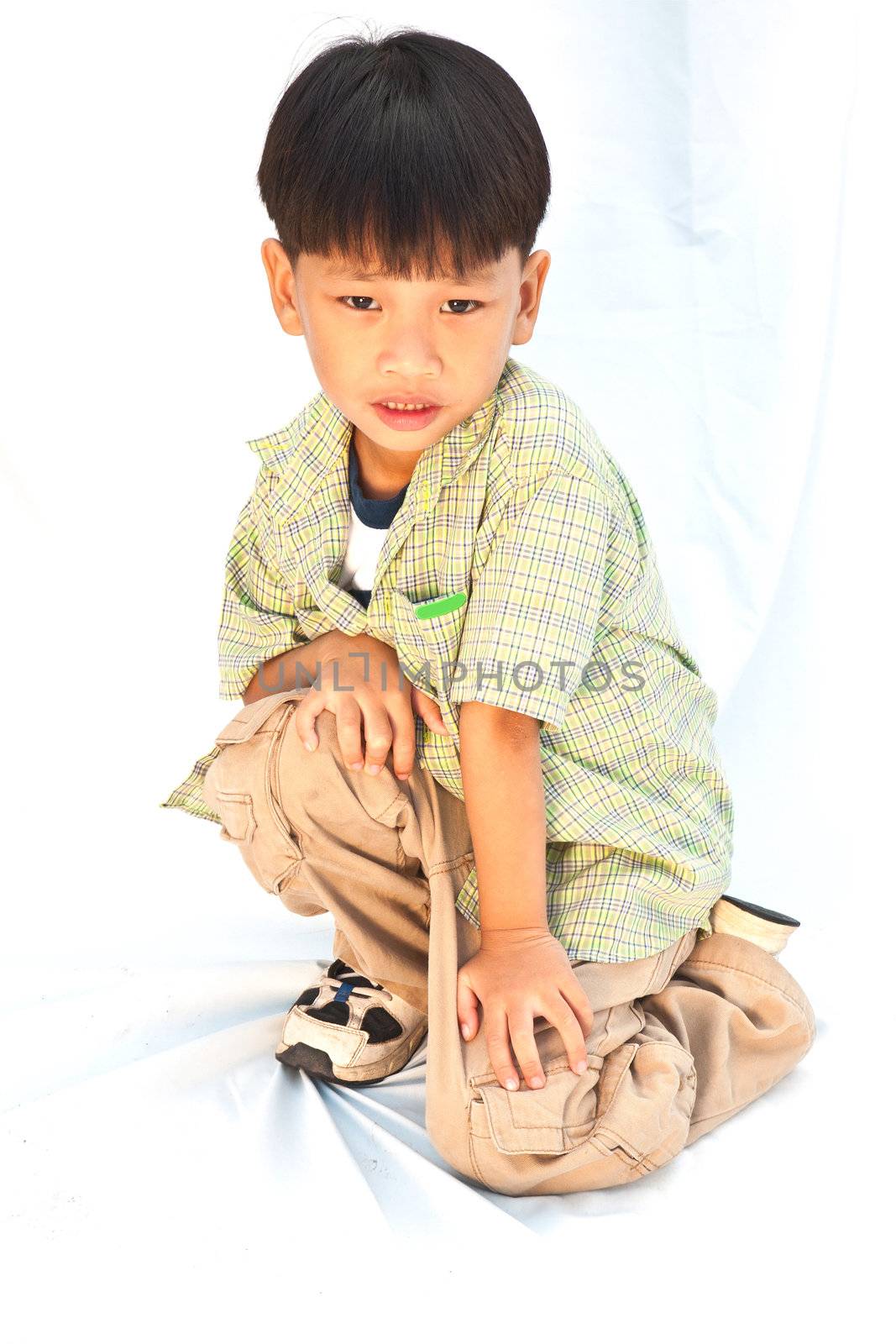 Asian little boy isolated on white background