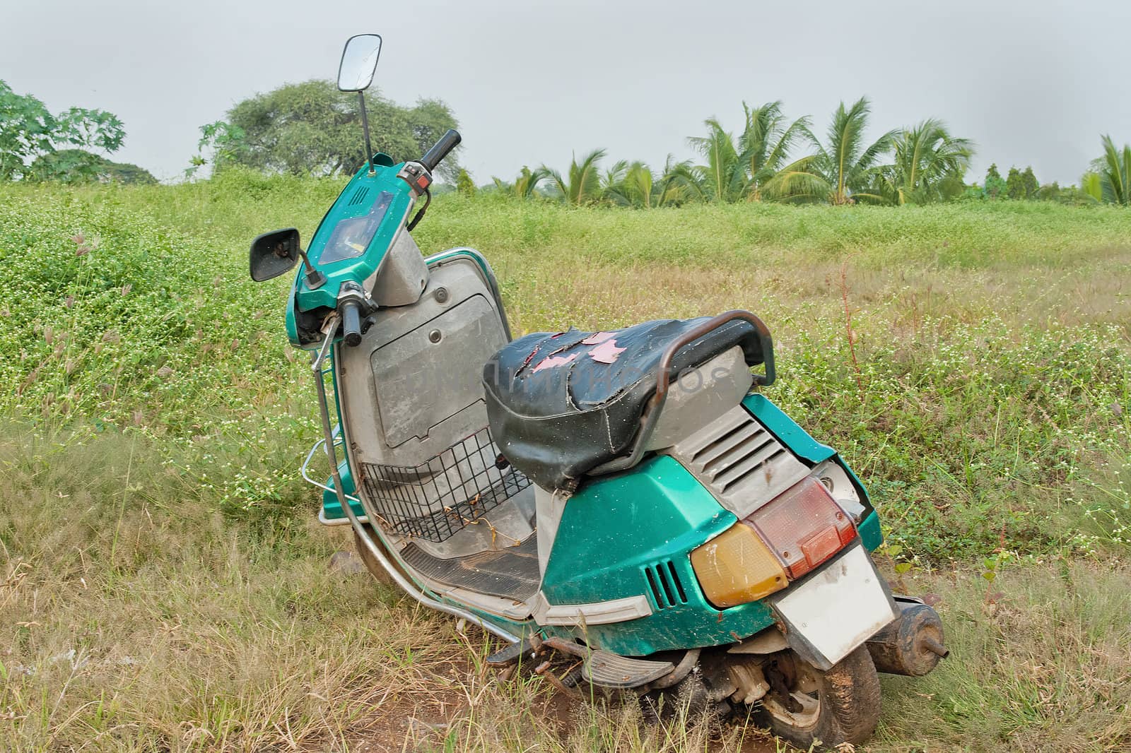 Pune, India, Generic photograph rendition of a dumped scooter that the owner doesnt want to get fixed