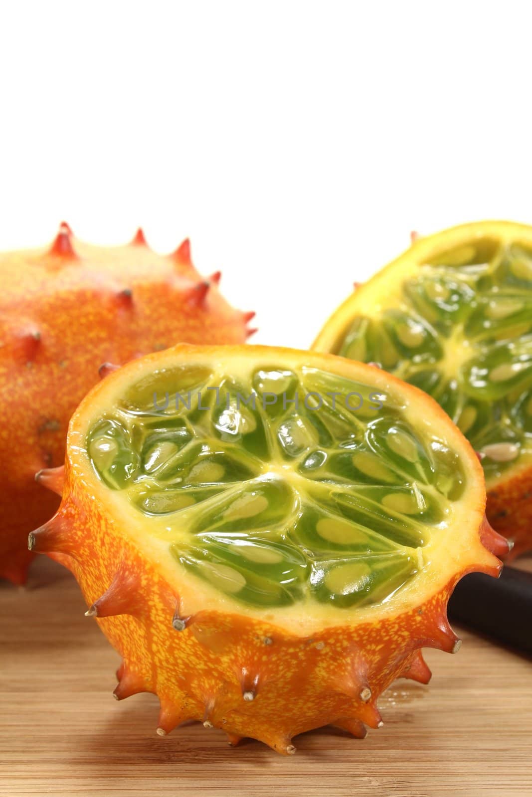 Kiwano on a wooden board by discovery