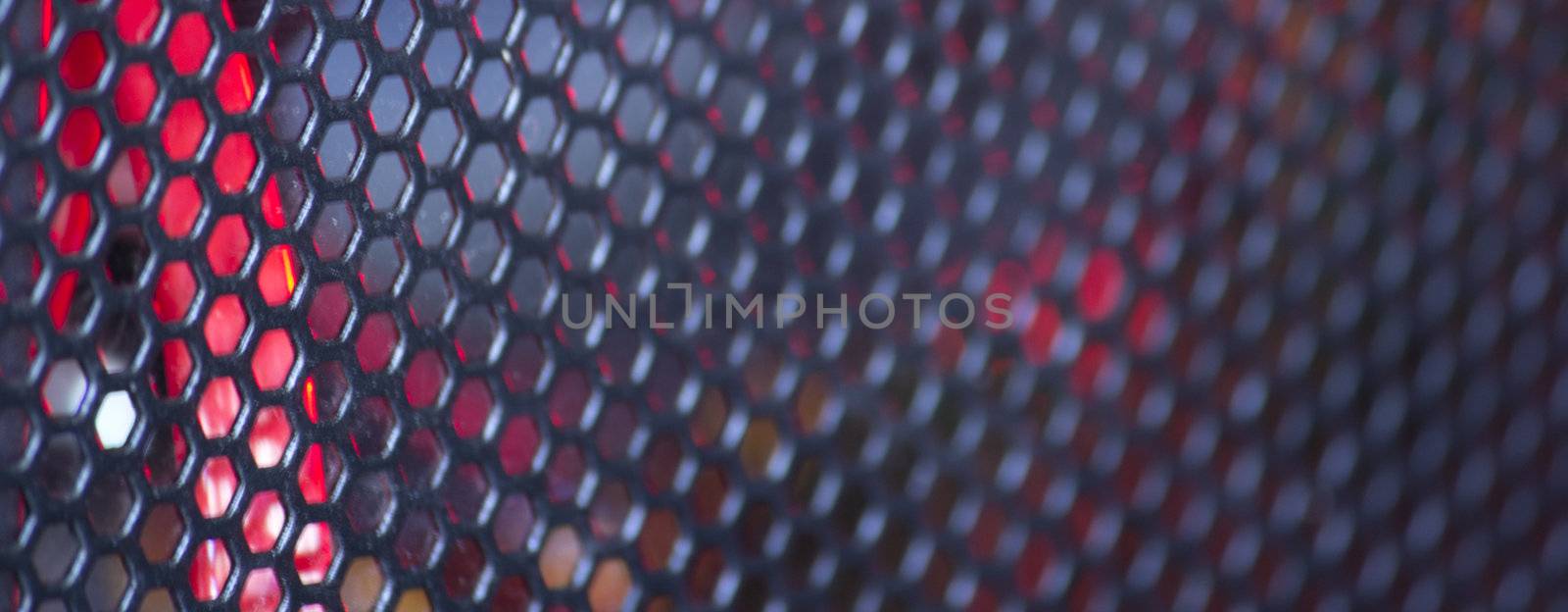 a red and black abstract mesh