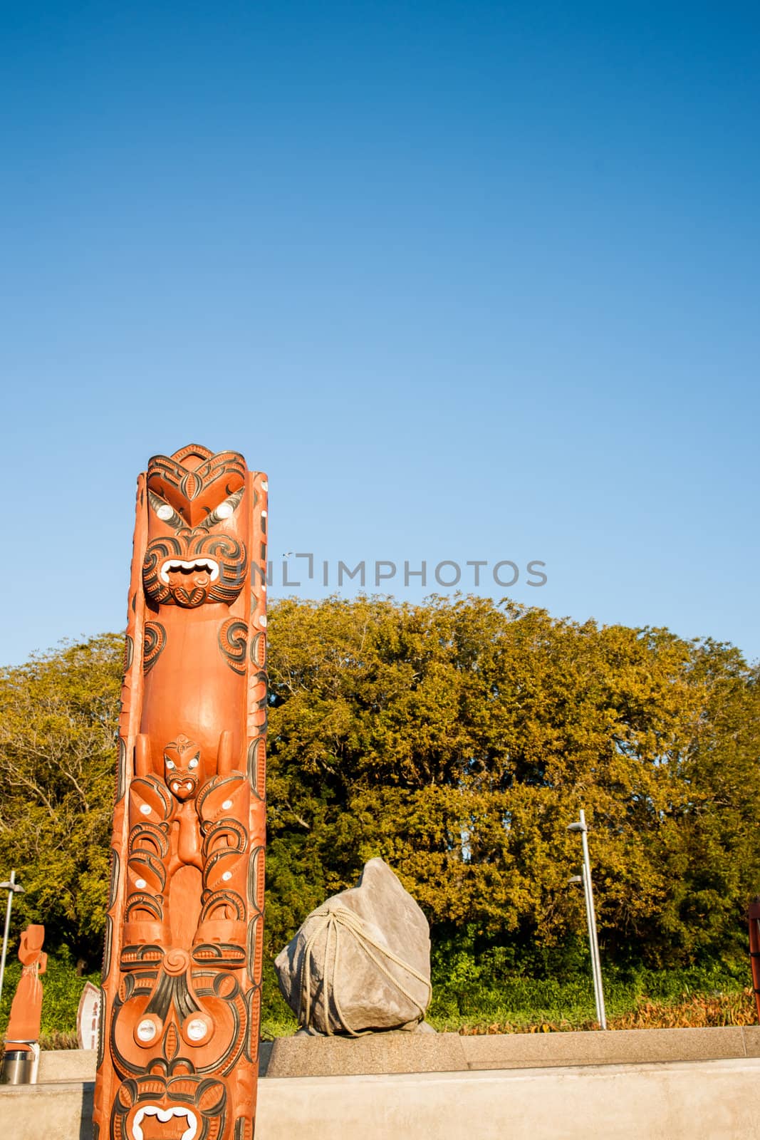 Maori carved pole, traditional indigenous art and culture