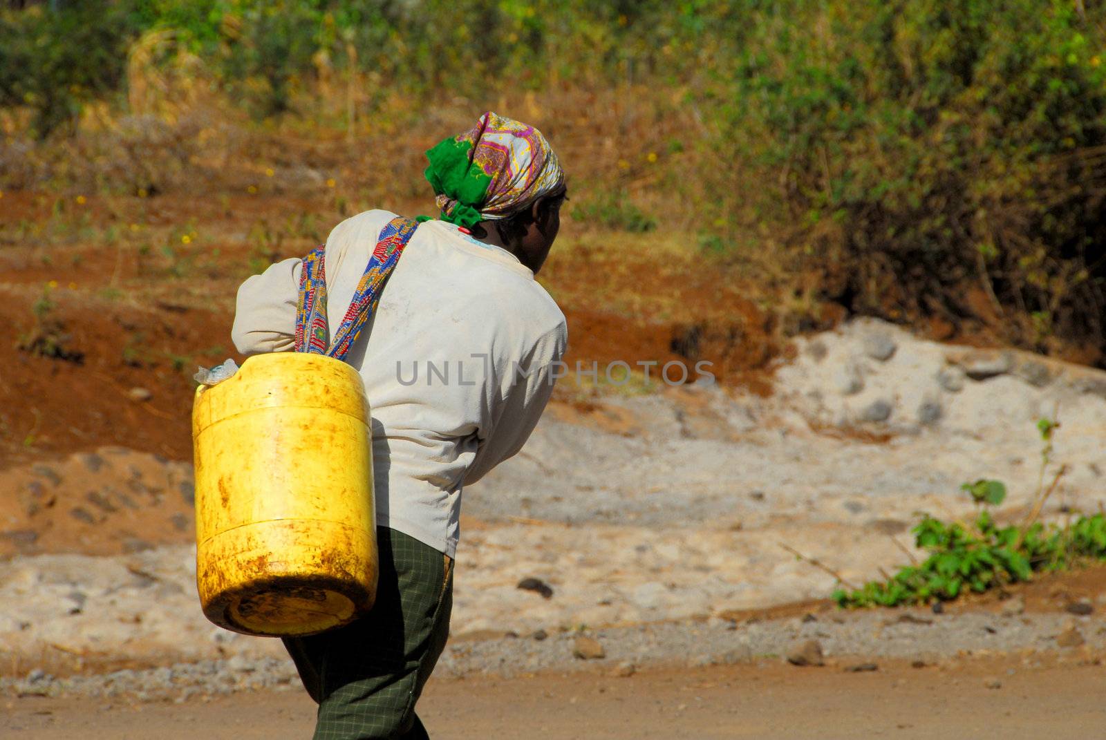 Mtito Andes, Kenya 13 JULY 2009: thanks to various humanitarian organizations,the people of the village of Andes Mtito can fetch water from a source.Mtito Andes is a village close to Kilimanjaro and the lack of water is very serious