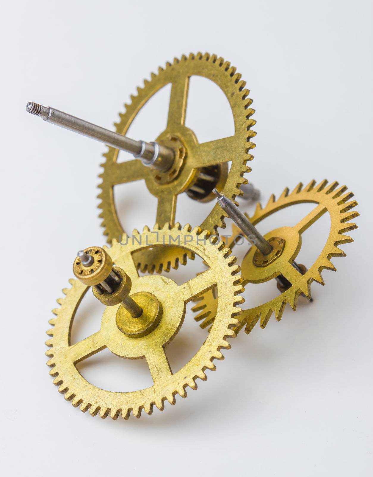 gears of the old clock on a white background