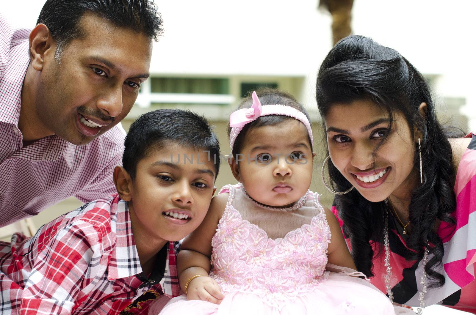 Happy Indian family having fun time at outdoor