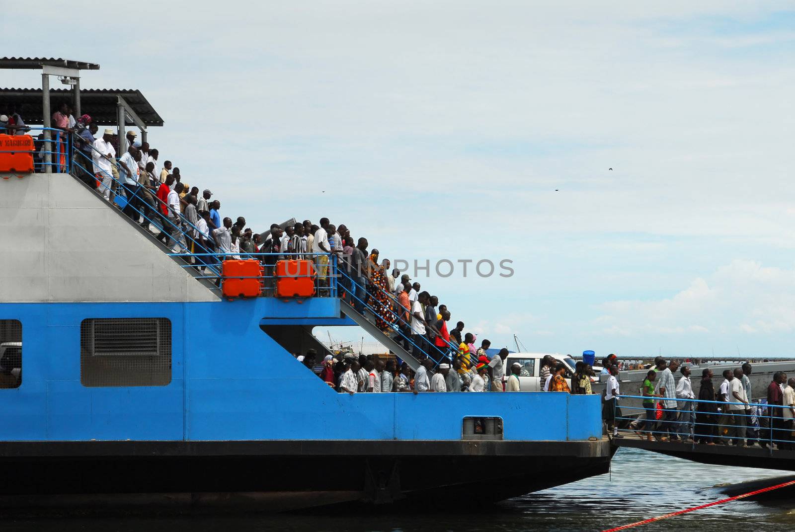 Dar es Salaam, Tanzania in February 25.2010: passengers in the ferry that leaves from the capital Dar Es Salaam to Bagamoyo.