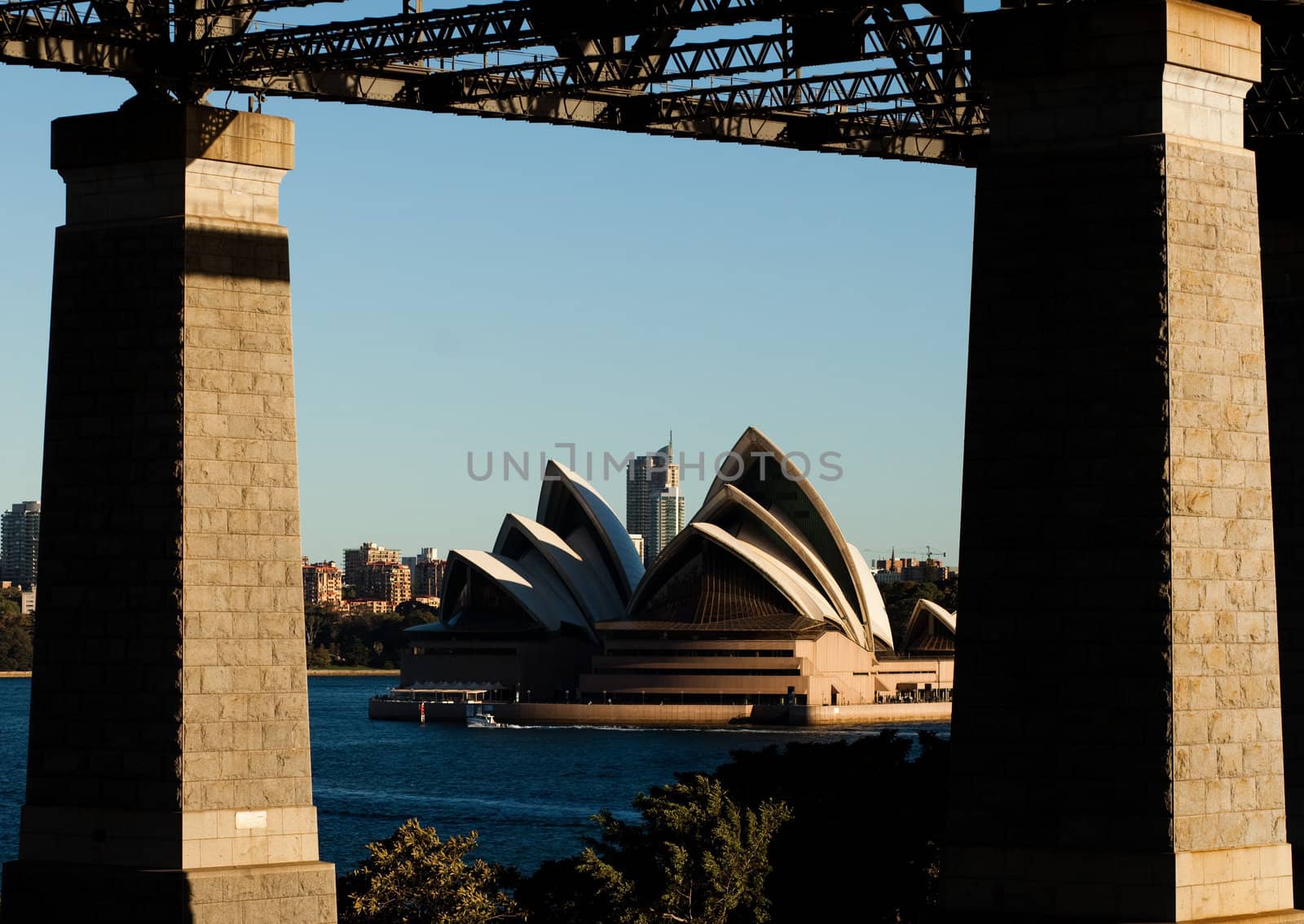 The Sydney Opera House framed by Sydney Harbor Bridge