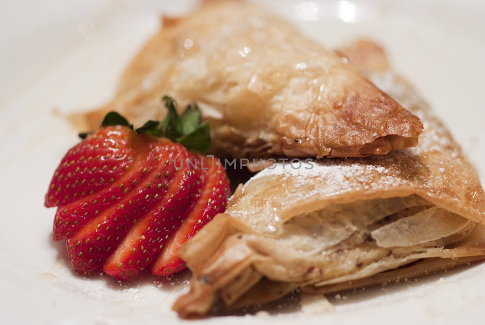 Filled Apple Pastries with Strawberries and Sugar