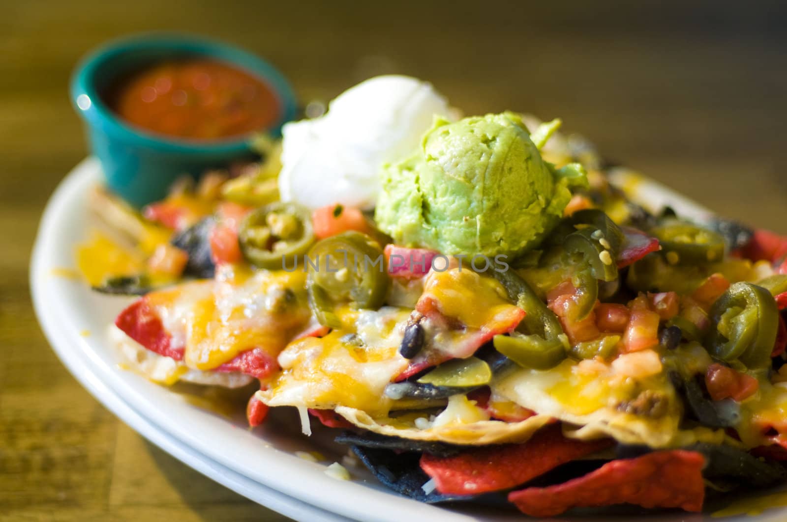 Nachos with cheese and guacamole by edan