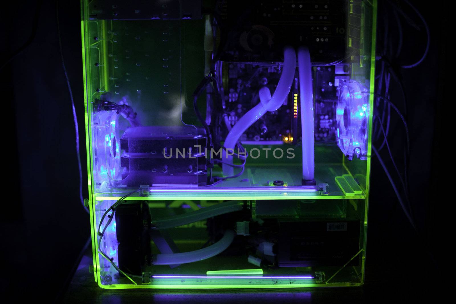 Transparent computer with liquid cooling and UV light