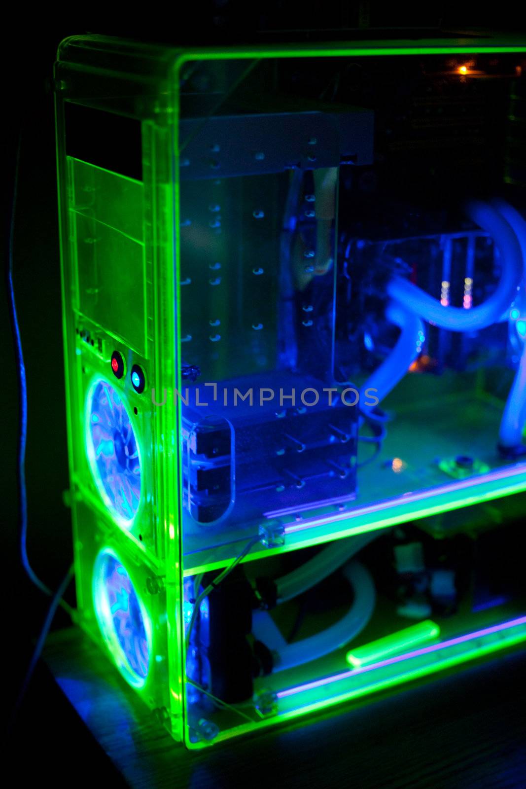 Transparent computer with liquid cooling and UV light