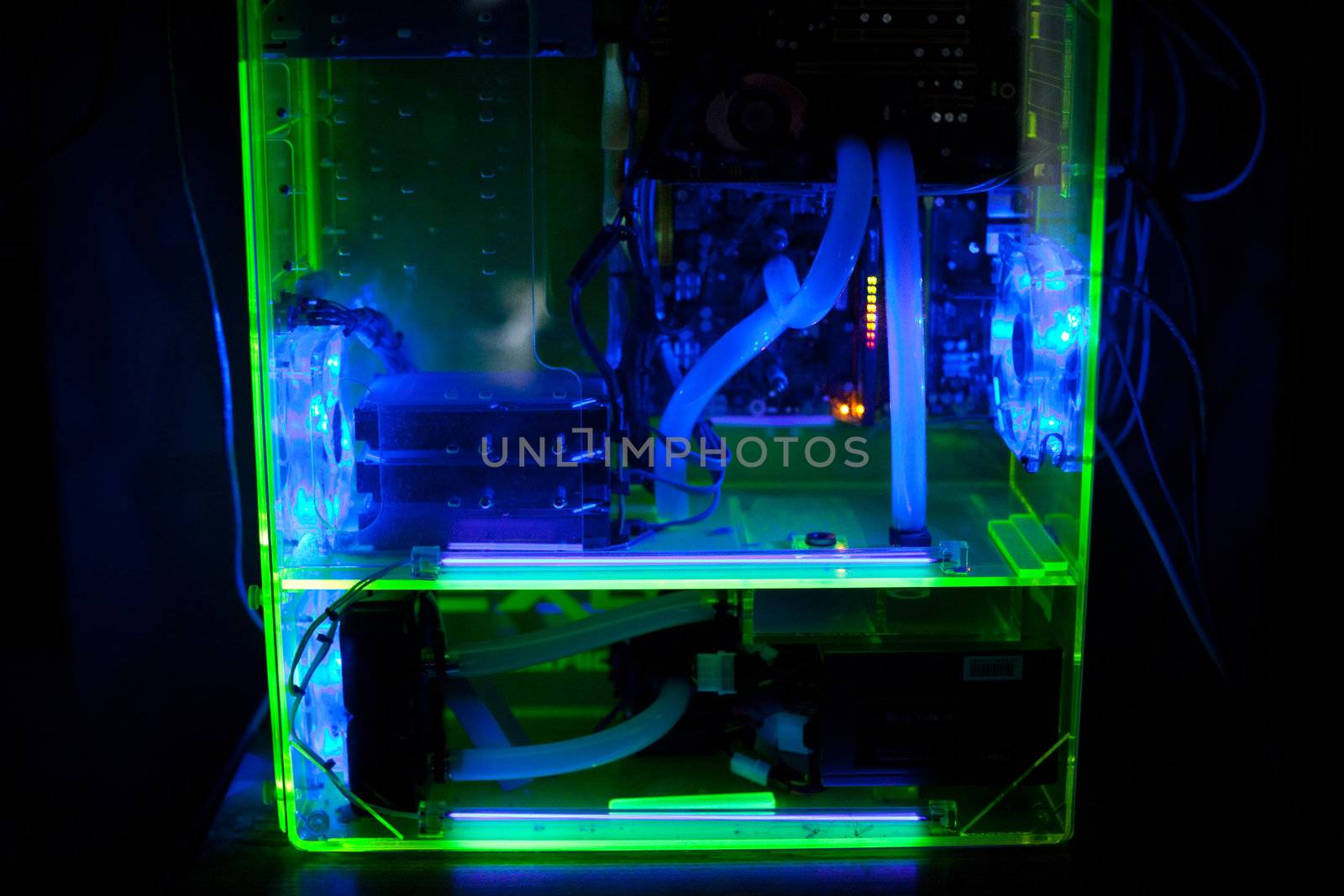 Transparent computer with liquid cooling and UV light