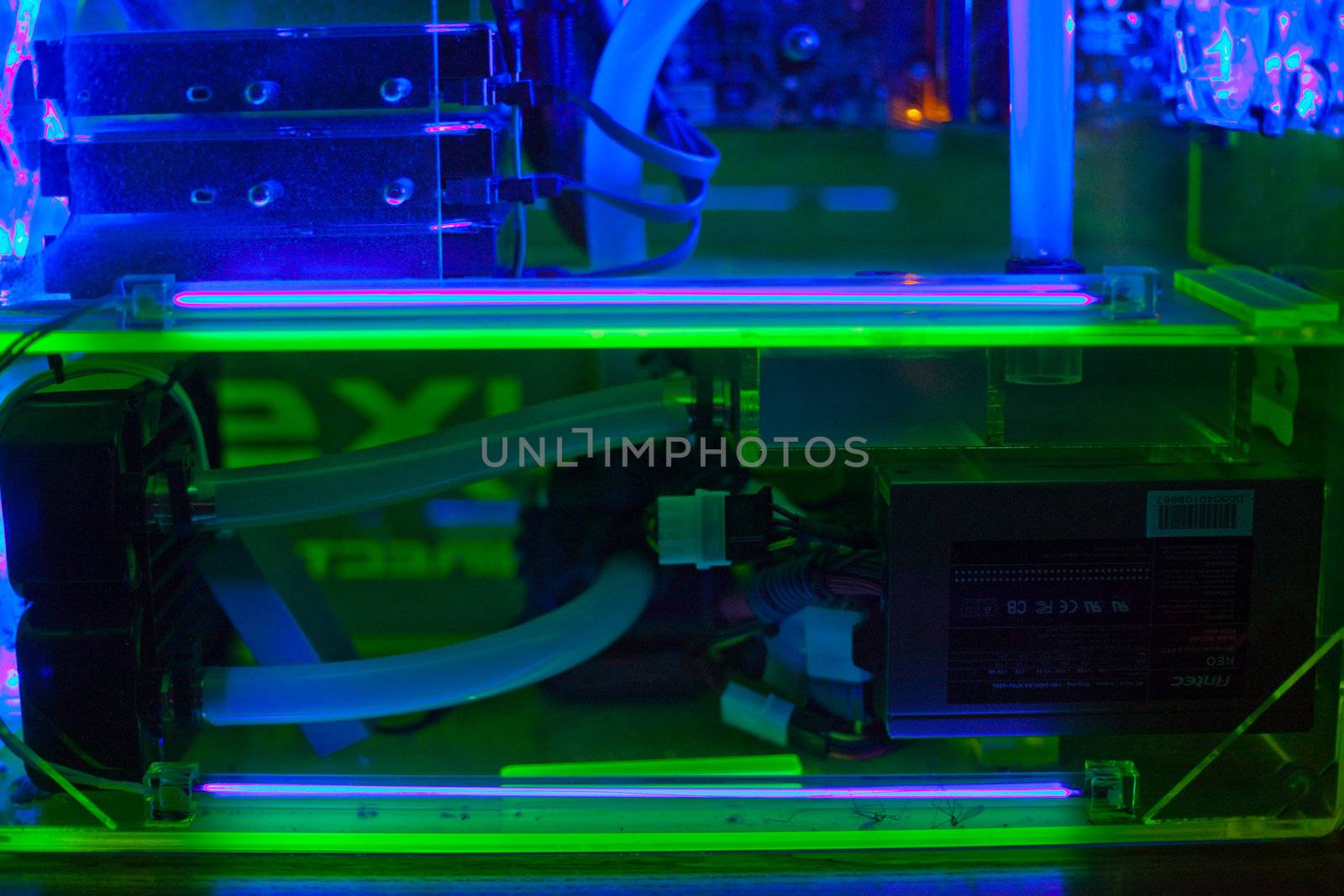 Transparent computer with liquid cooling and UV light