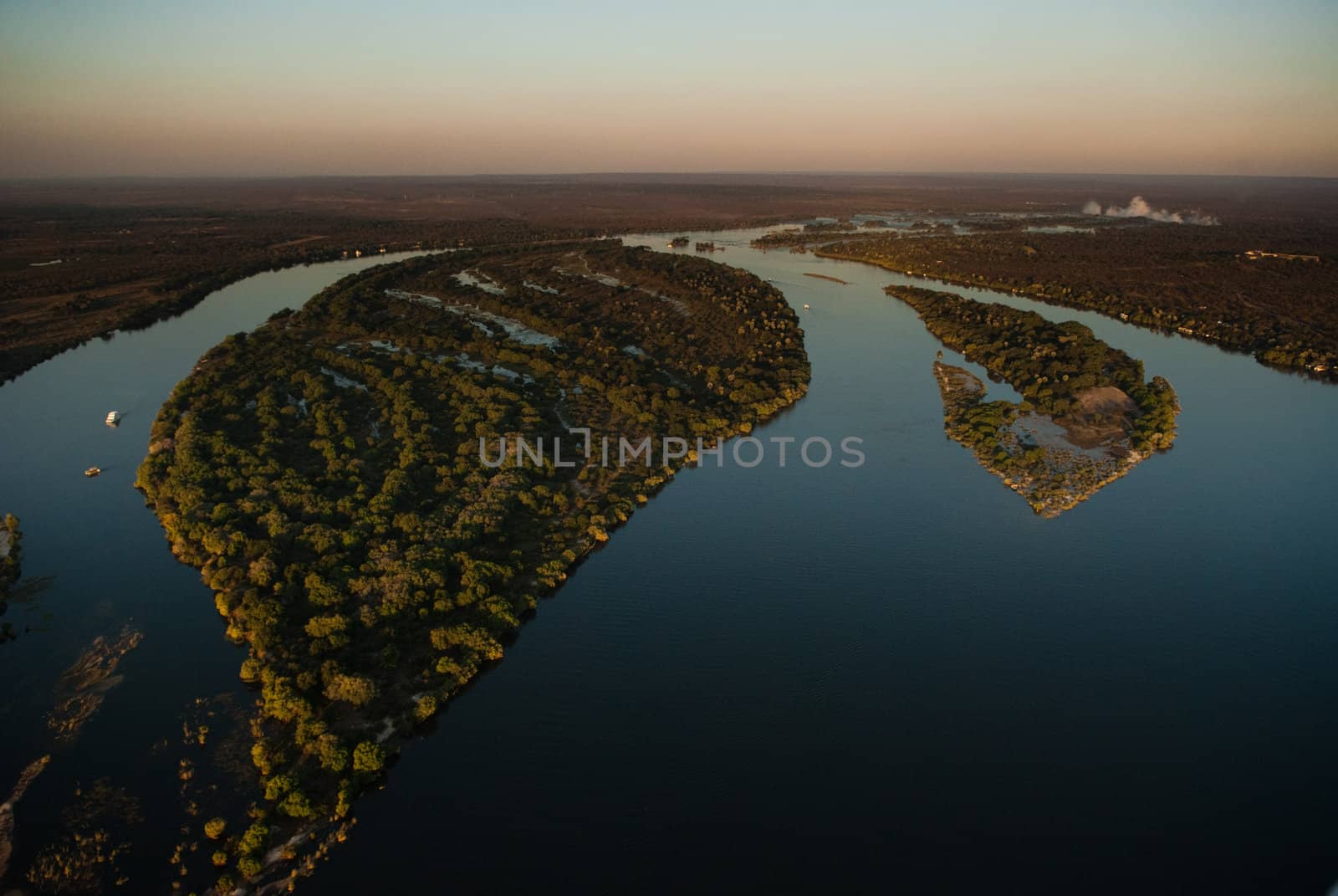 Aerial view of the Zambezi river with riverboats