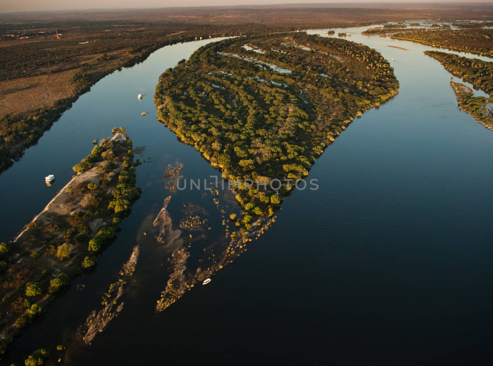 Aerial view of the Zambezi river with riverboats