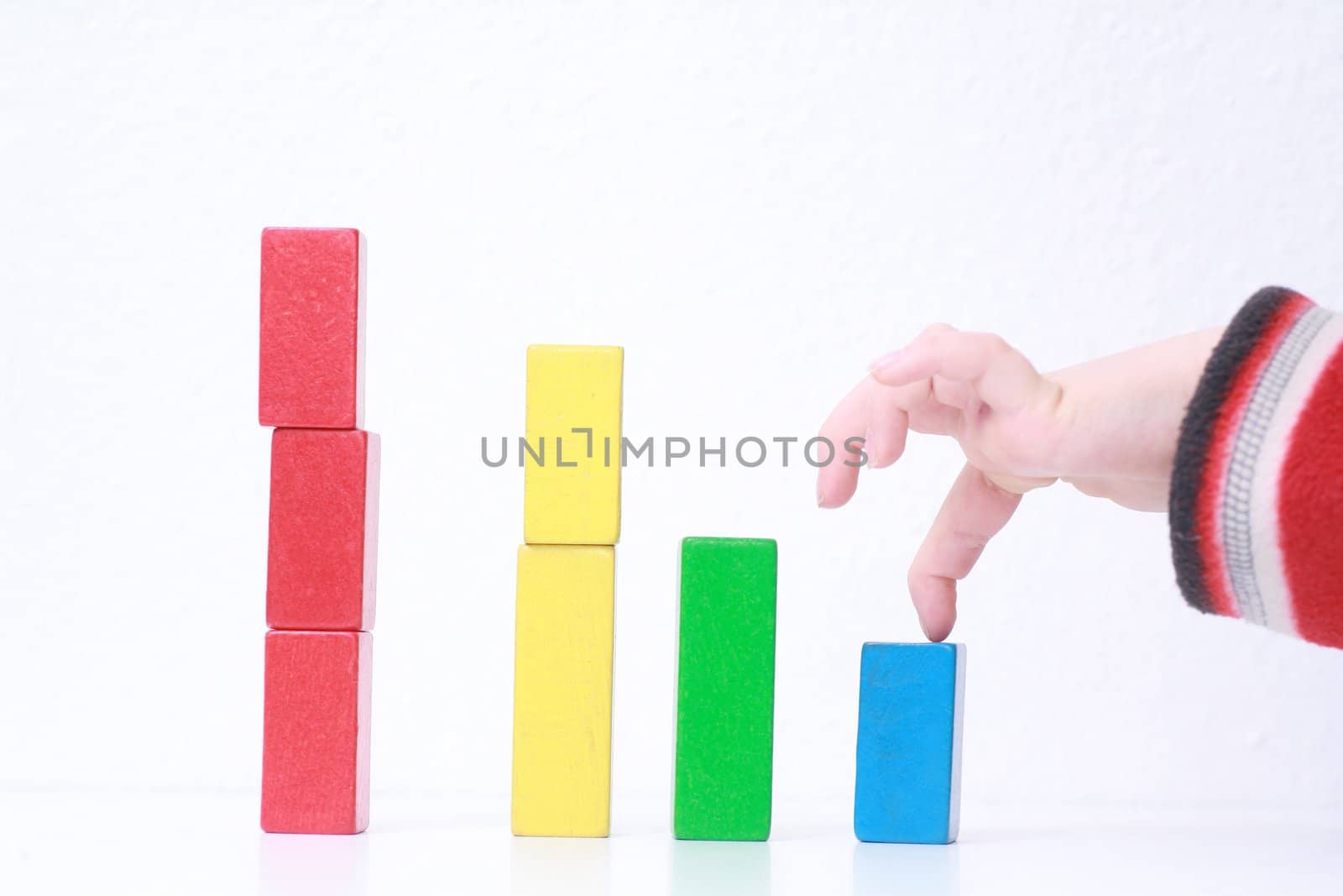 sales charts symbolized by wood toys............