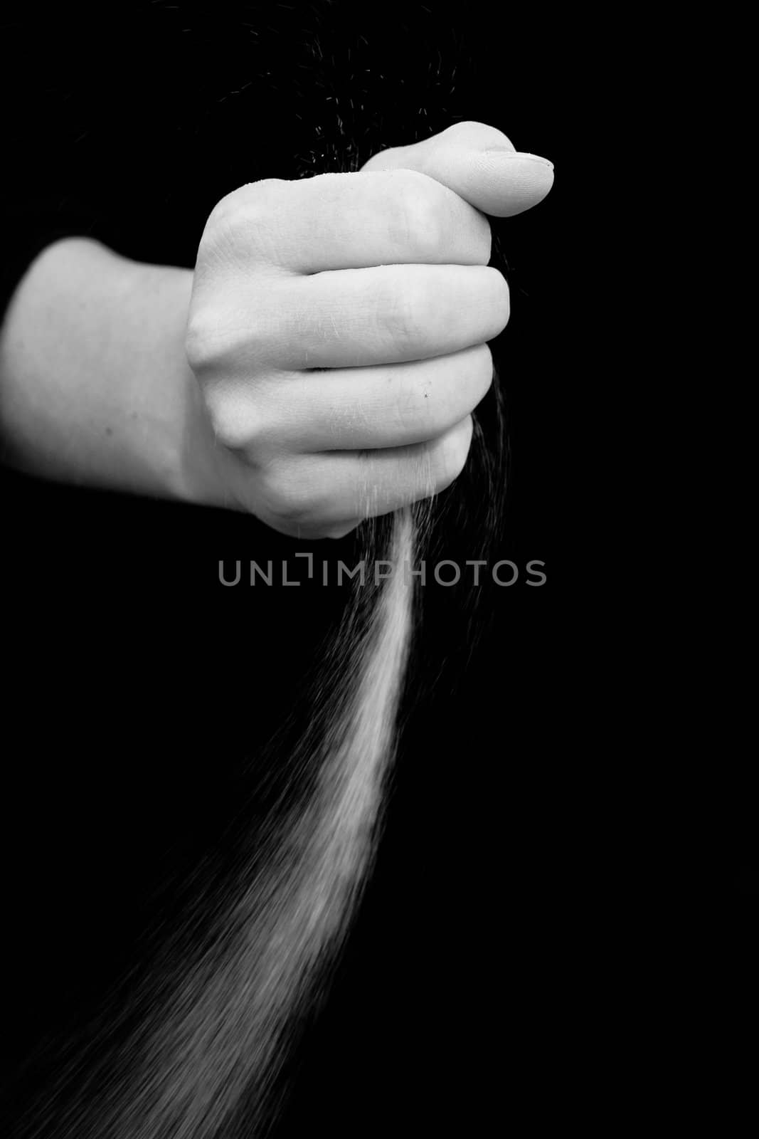 sand running through hands as a symbol for time running, lost etc.............