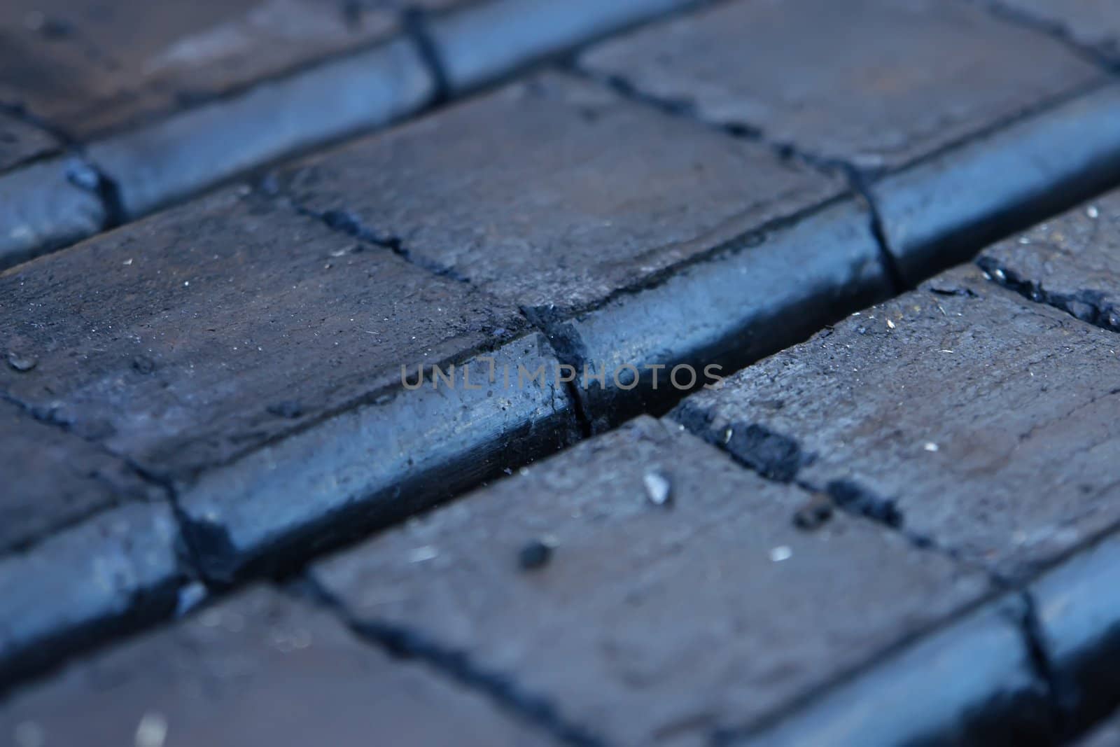 stack of dark coal briquettes