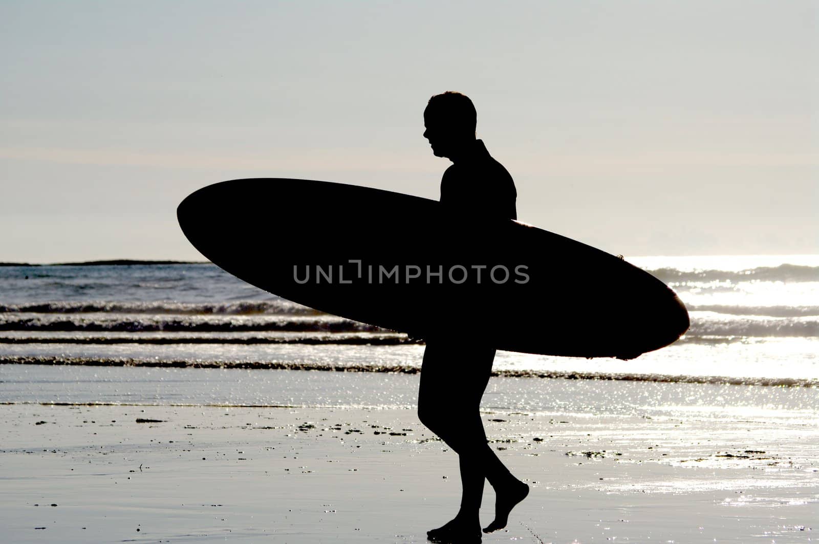 surfing at a nice beach outside at the sea